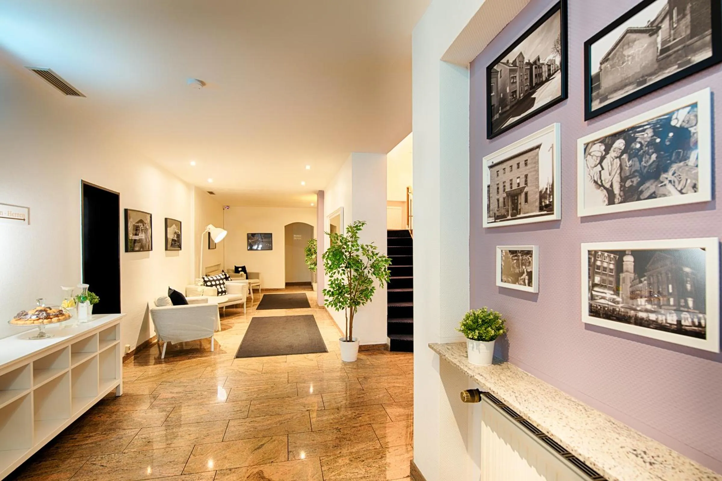 Lobby or reception in Home Hotel