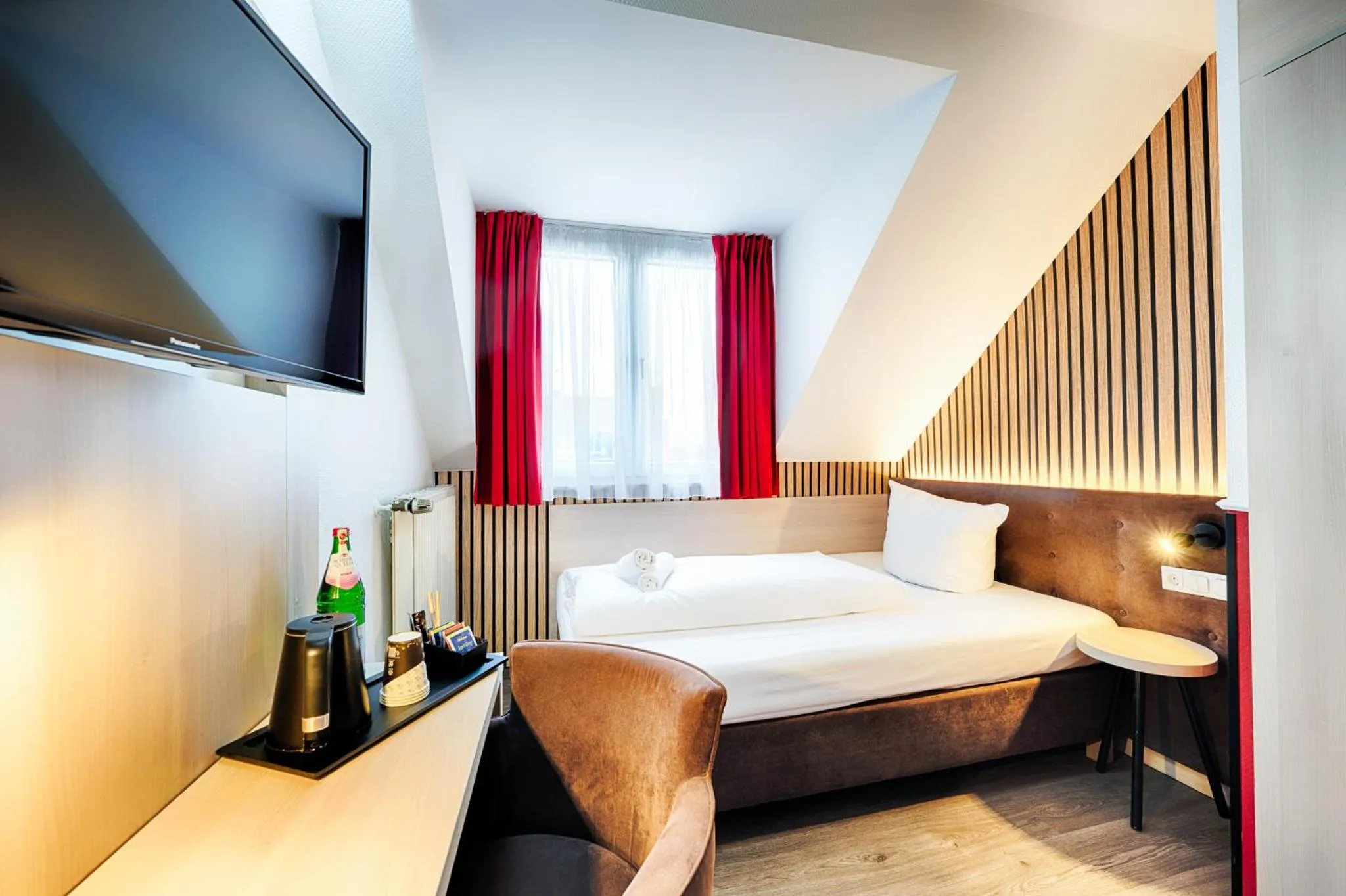 Photo of the whole room, Bed in Home Hotel