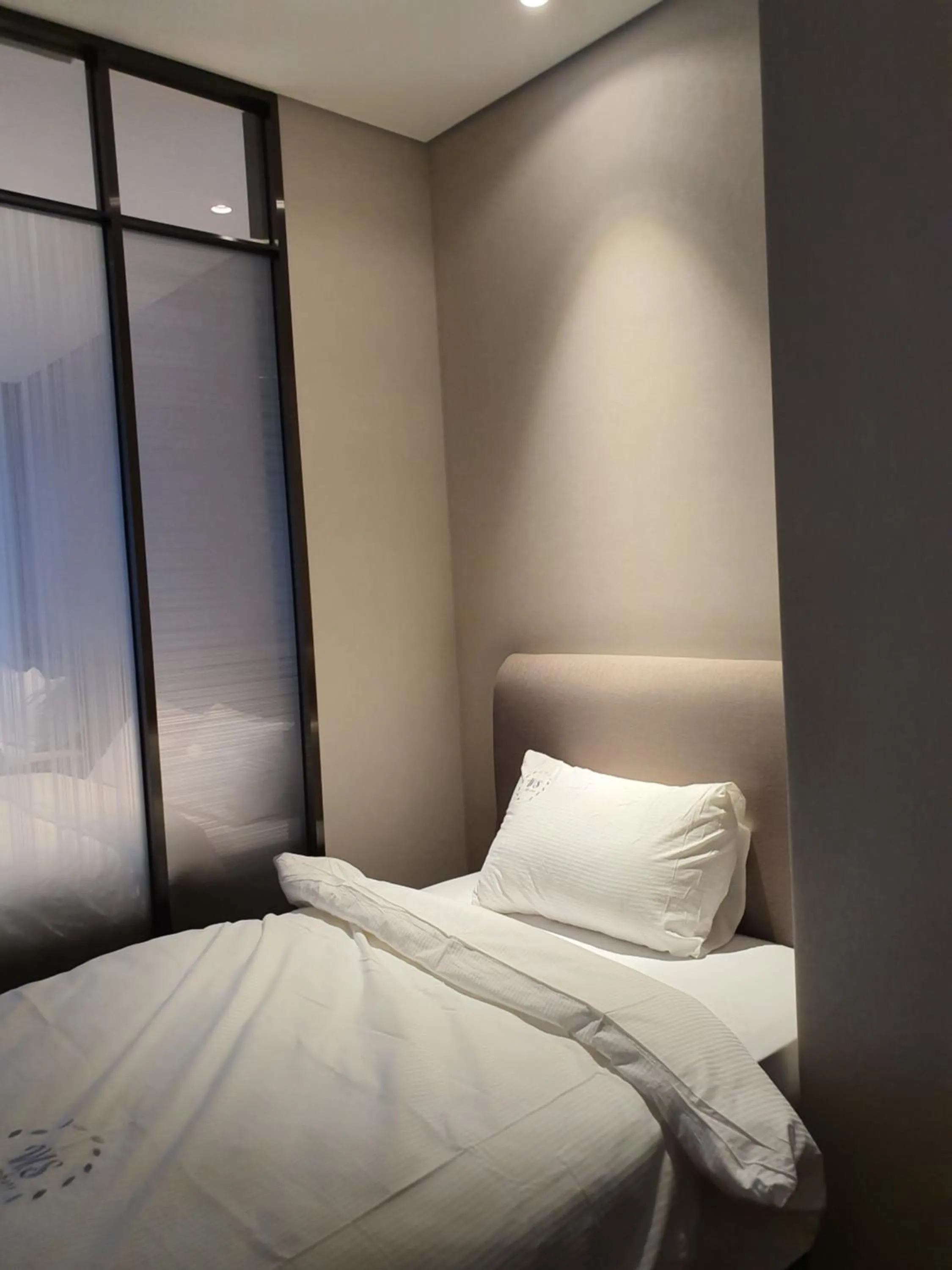 Bed in World State Hotel Sokcho