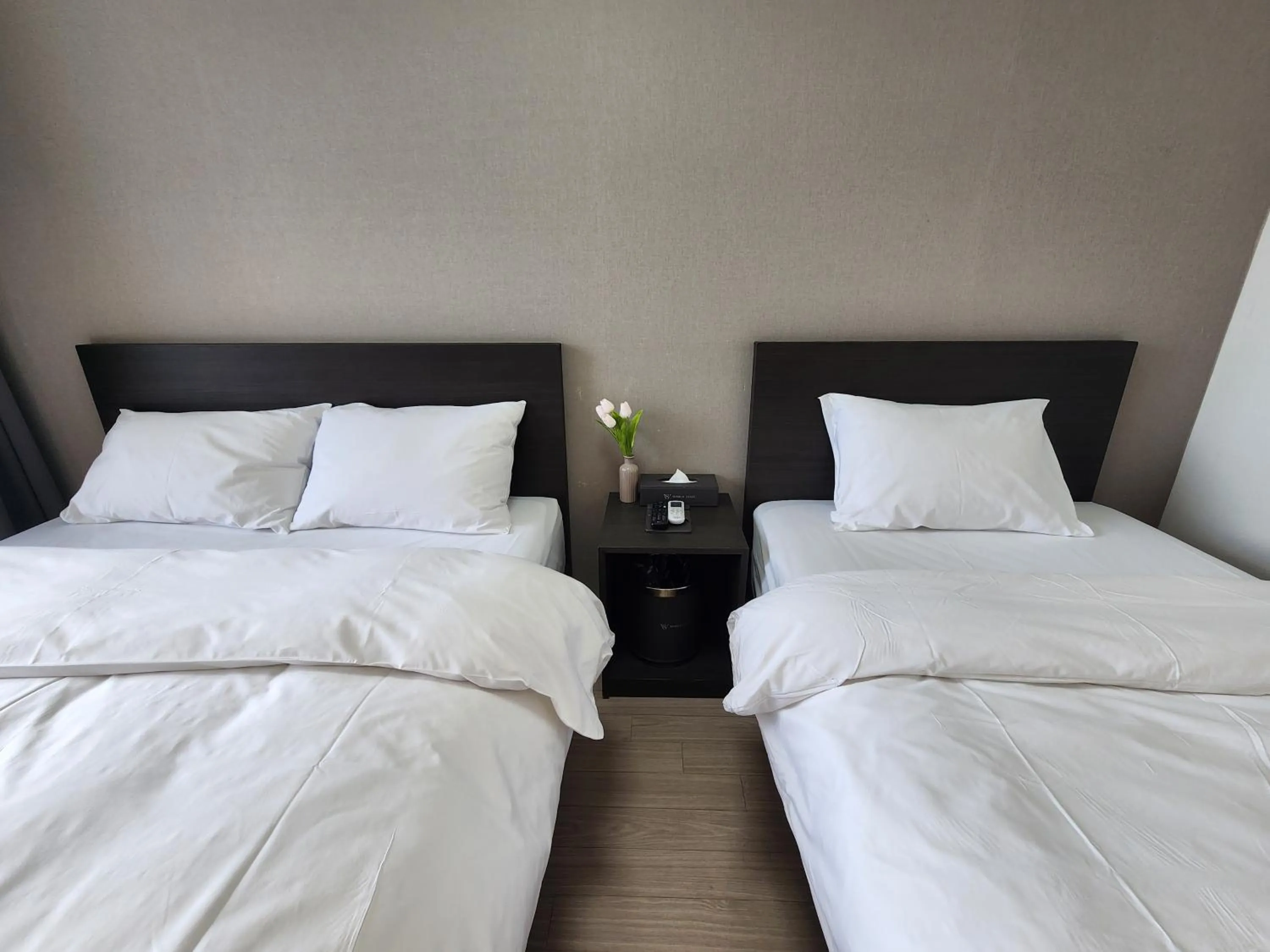 Bed in World State Hotel Sokcho