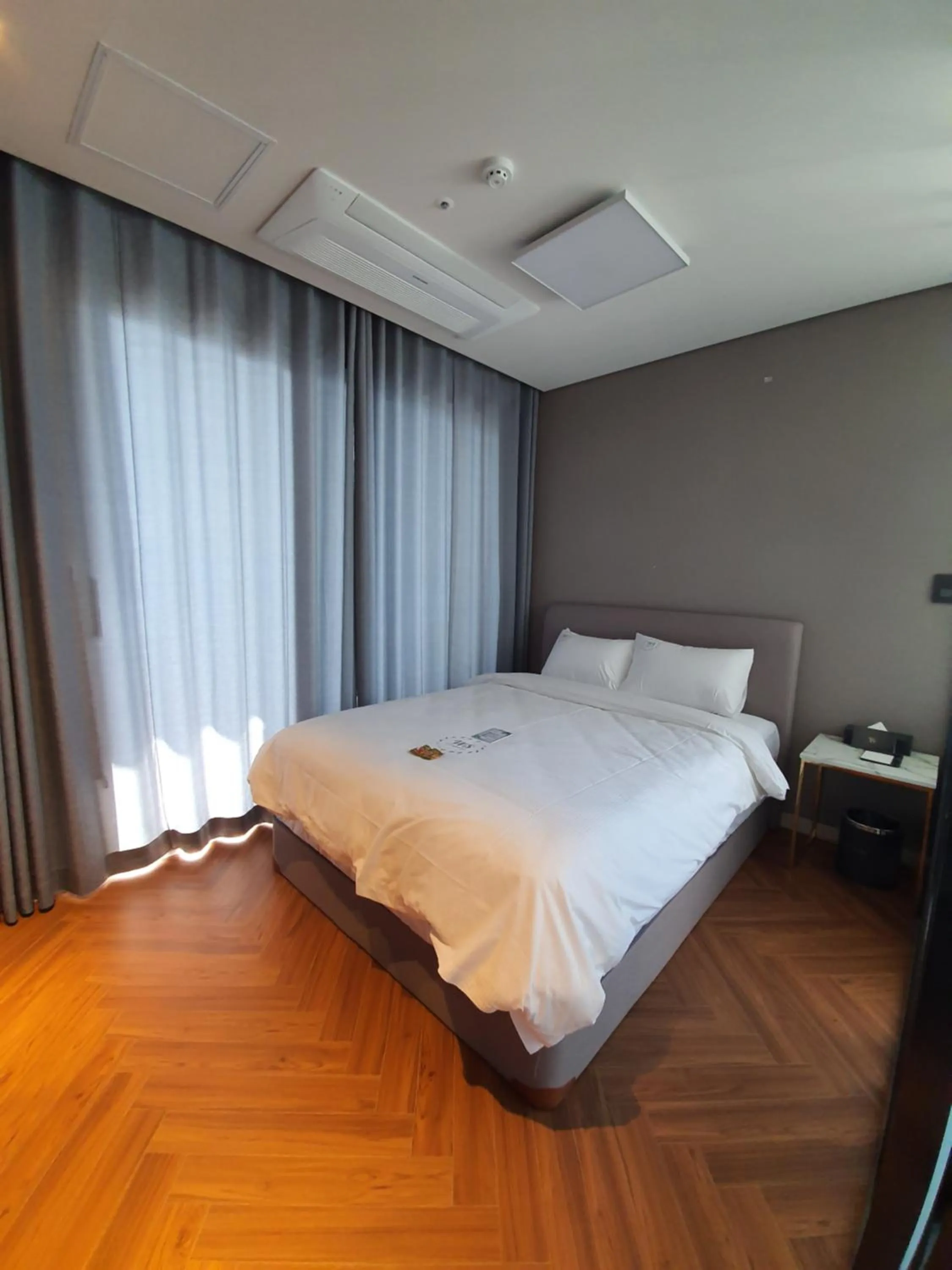Bed in World State Hotel Sokcho