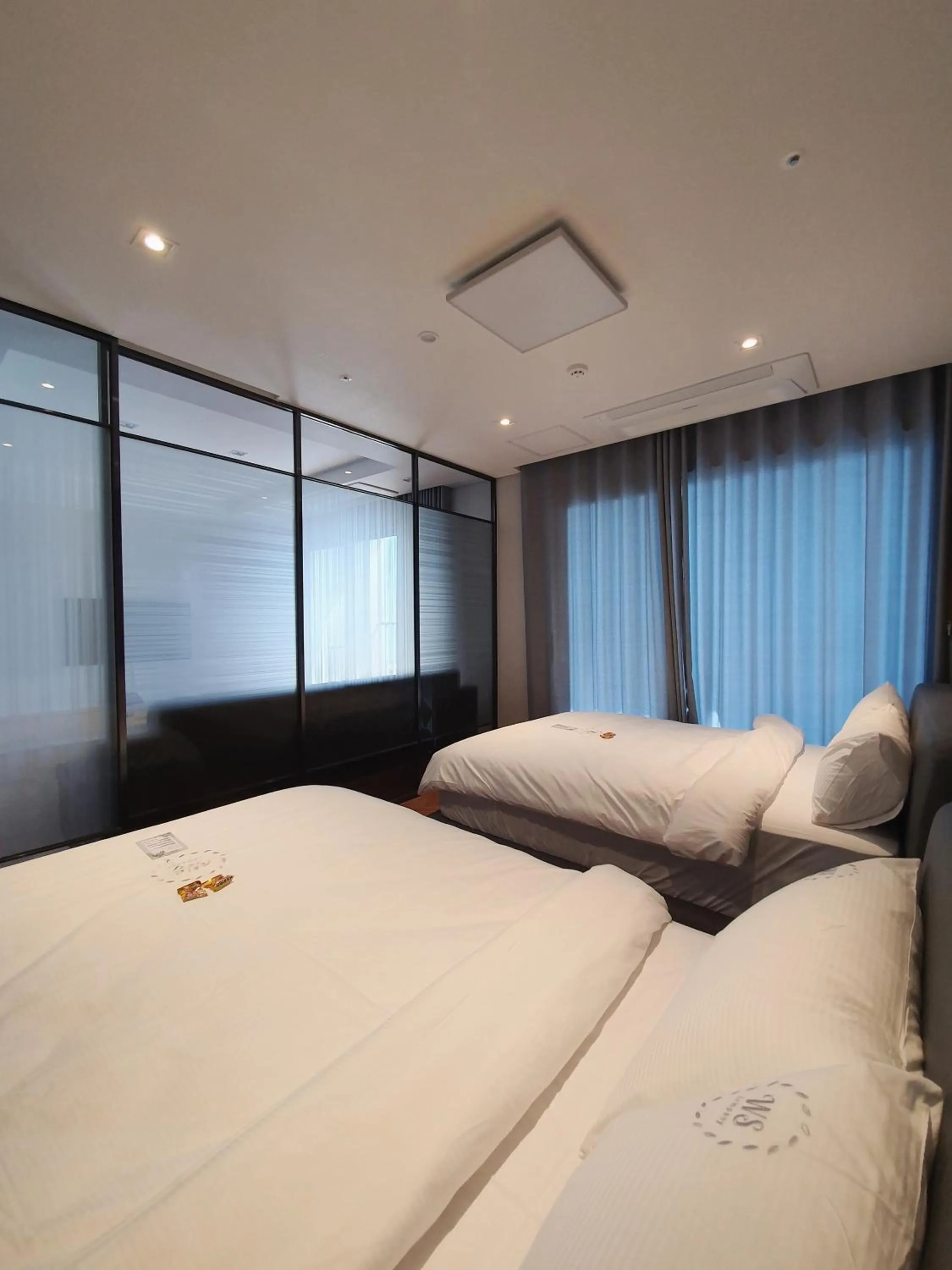 Bed in World State Hotel Sokcho