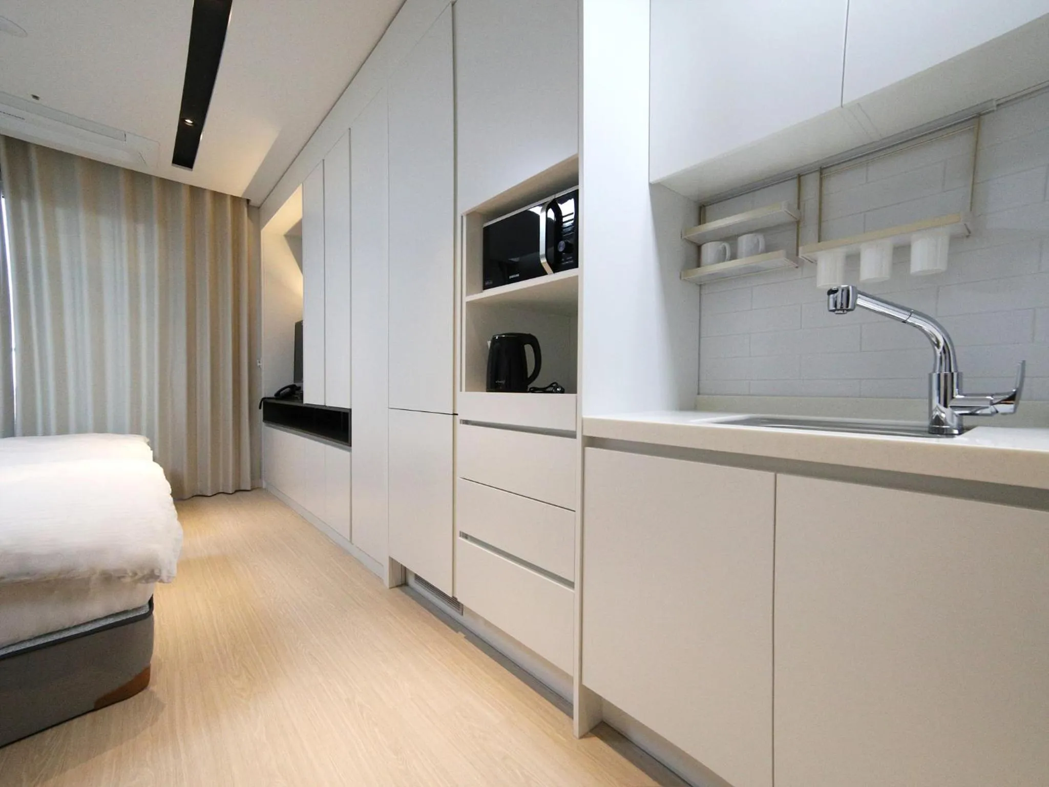 Bed in World State Hotel Sokcho