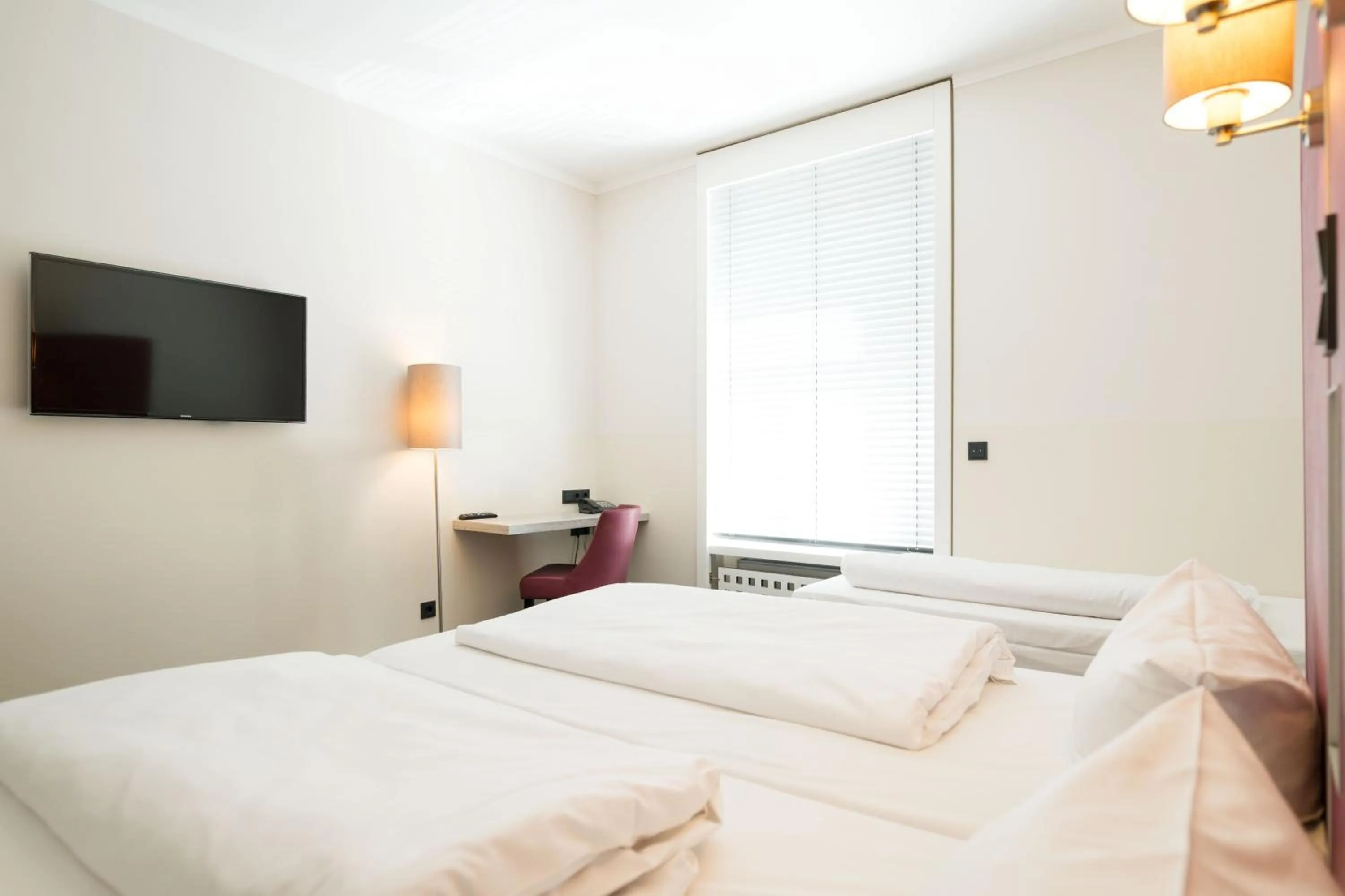 Bed in Hotel Topas Frankfurt City Centre