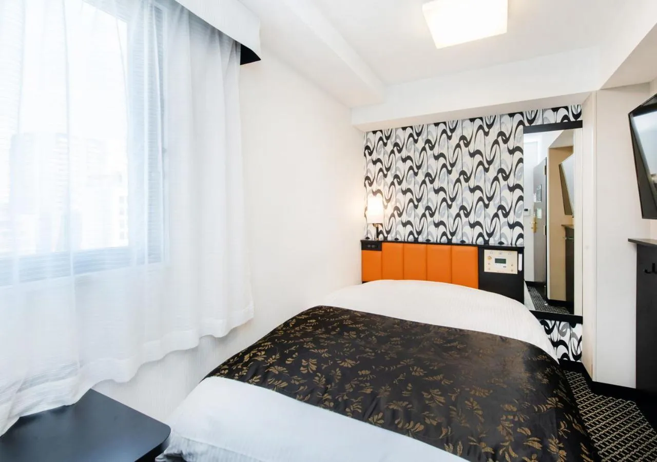 Photo of the whole room, Bed in APA Hotel Fukuoka Tenjin Nishi