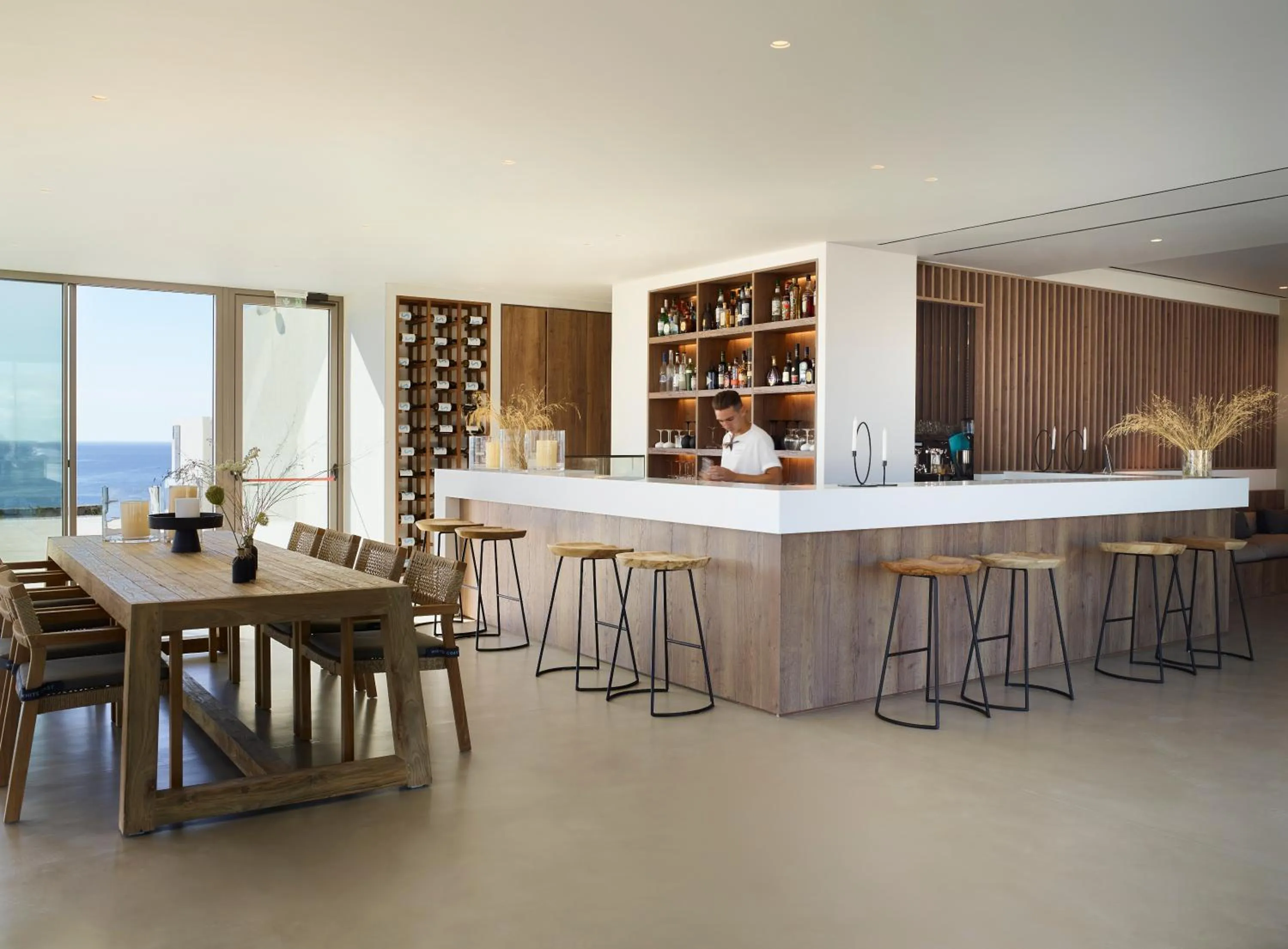 Lounge or bar in Domes White Coast Milos, Adults Only