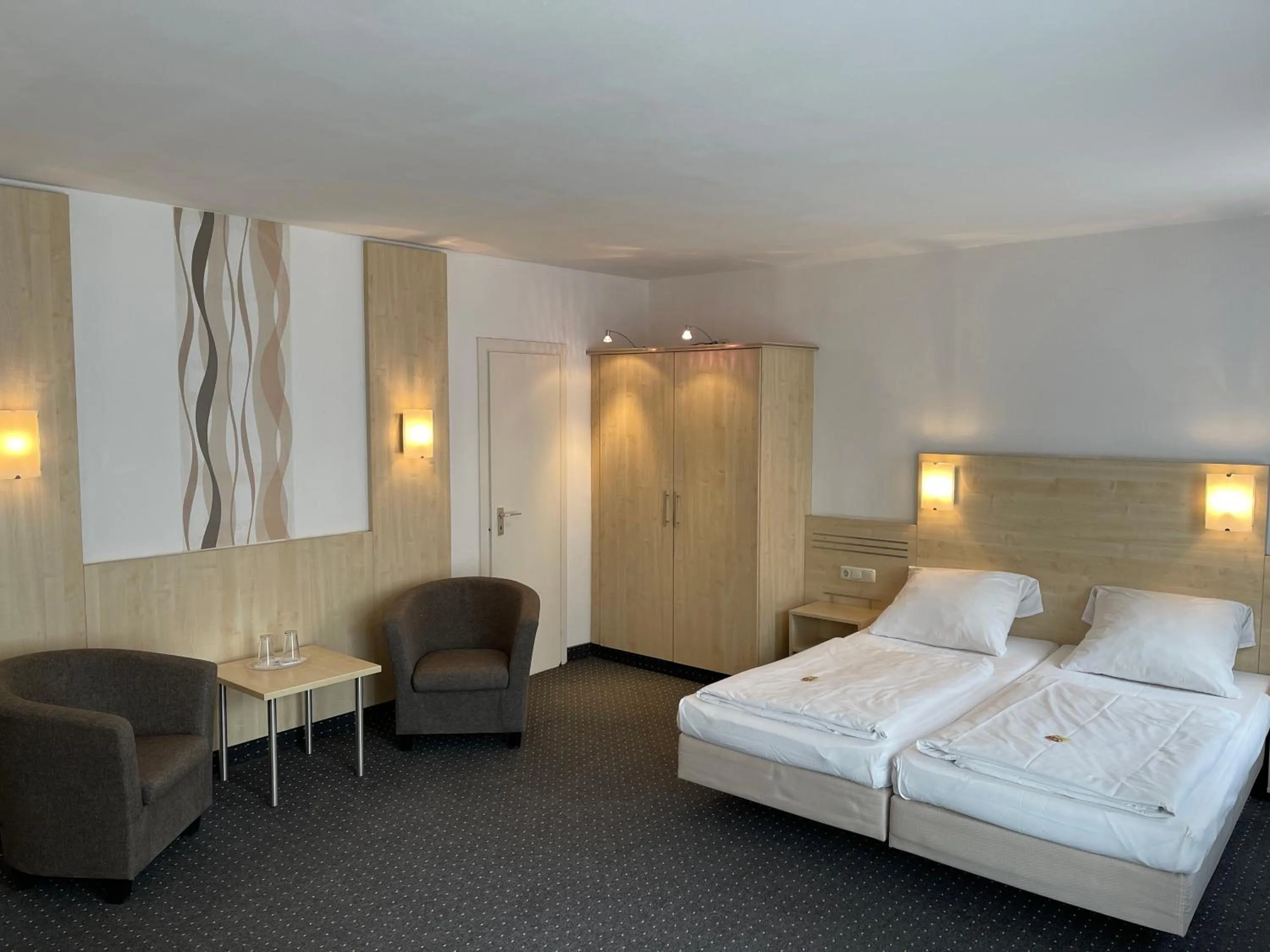 Bed in Hotel Mondial Comfort - Frankfurt City Centre