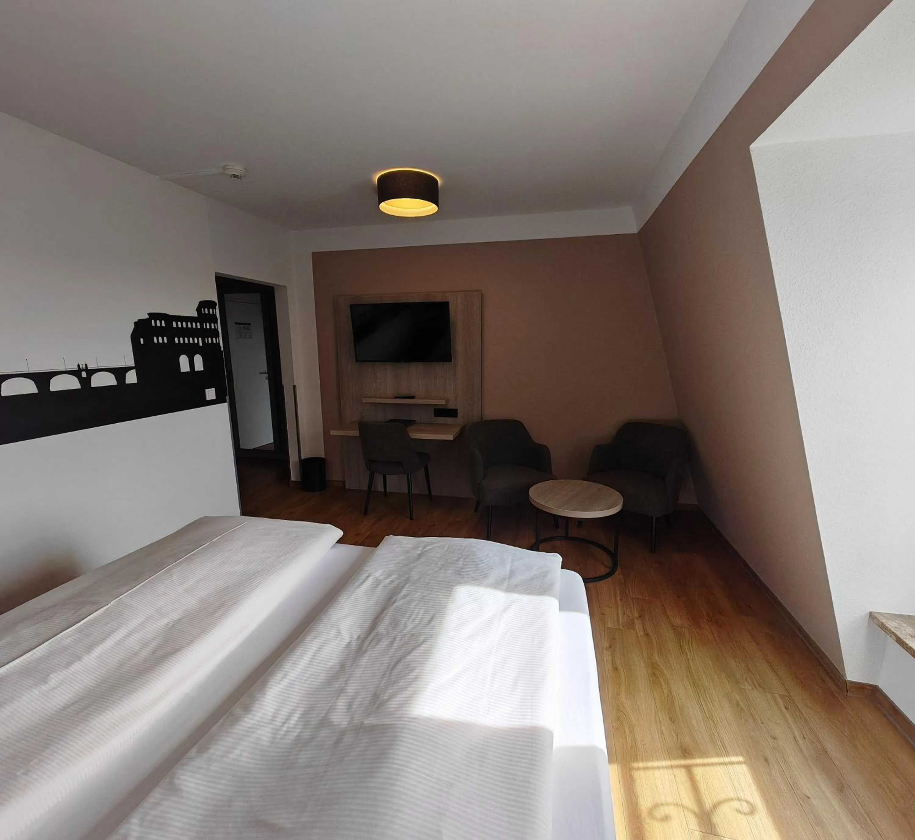 Photo of the whole room, Bed in Berghotel Kockelsberg