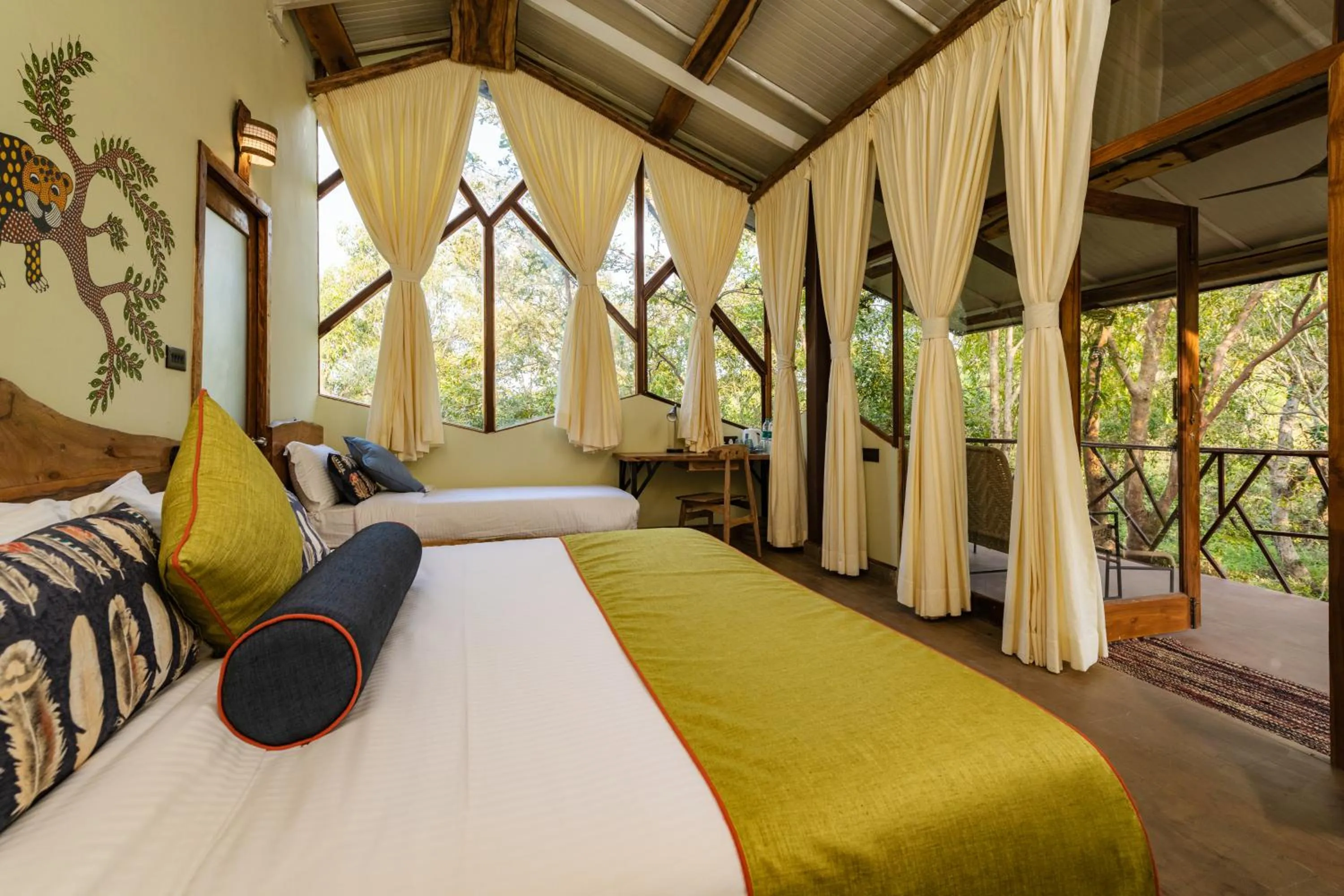 Bed in Kanha Jungle Camp