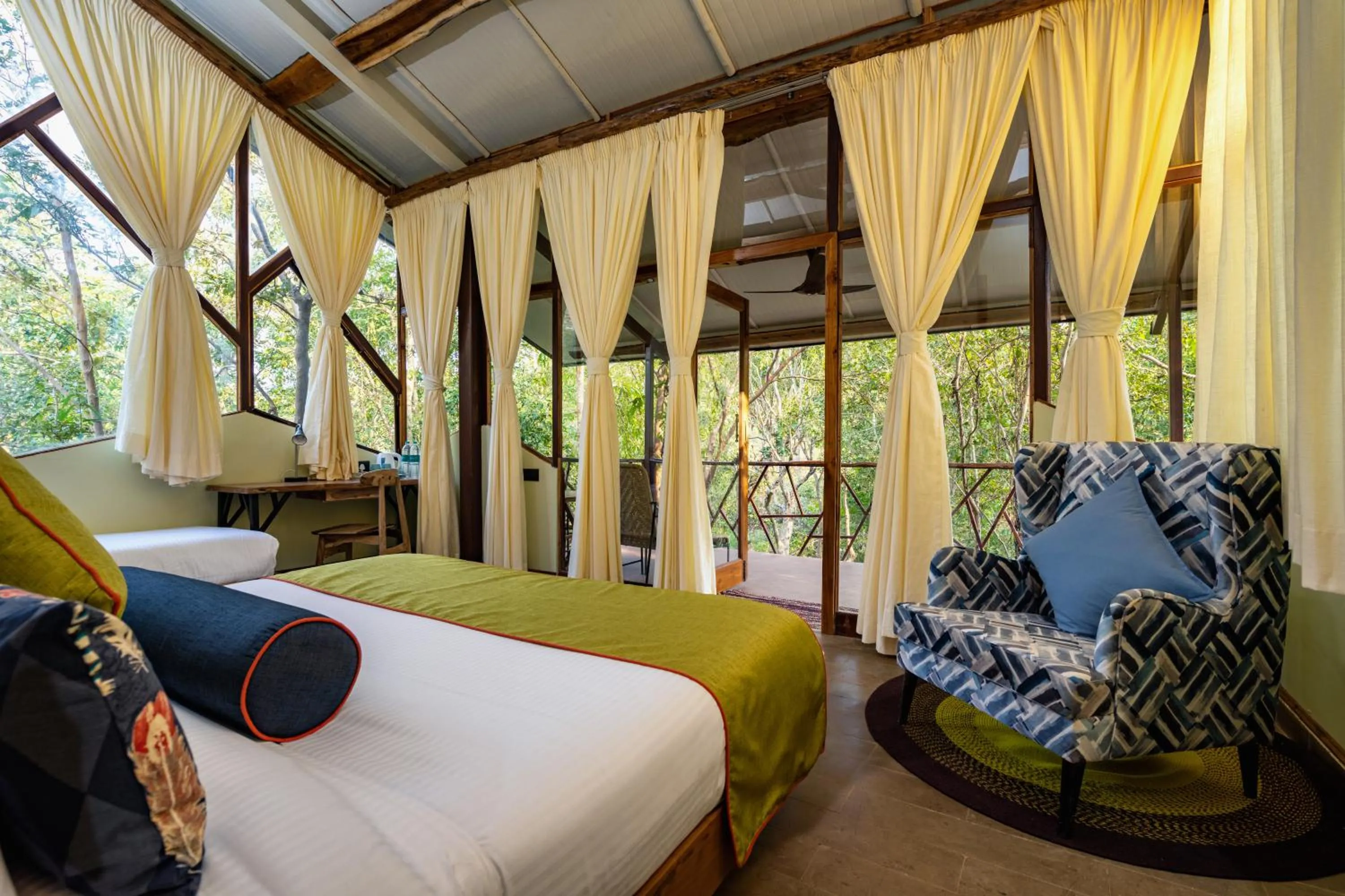 Bed in Kanha Jungle Camp