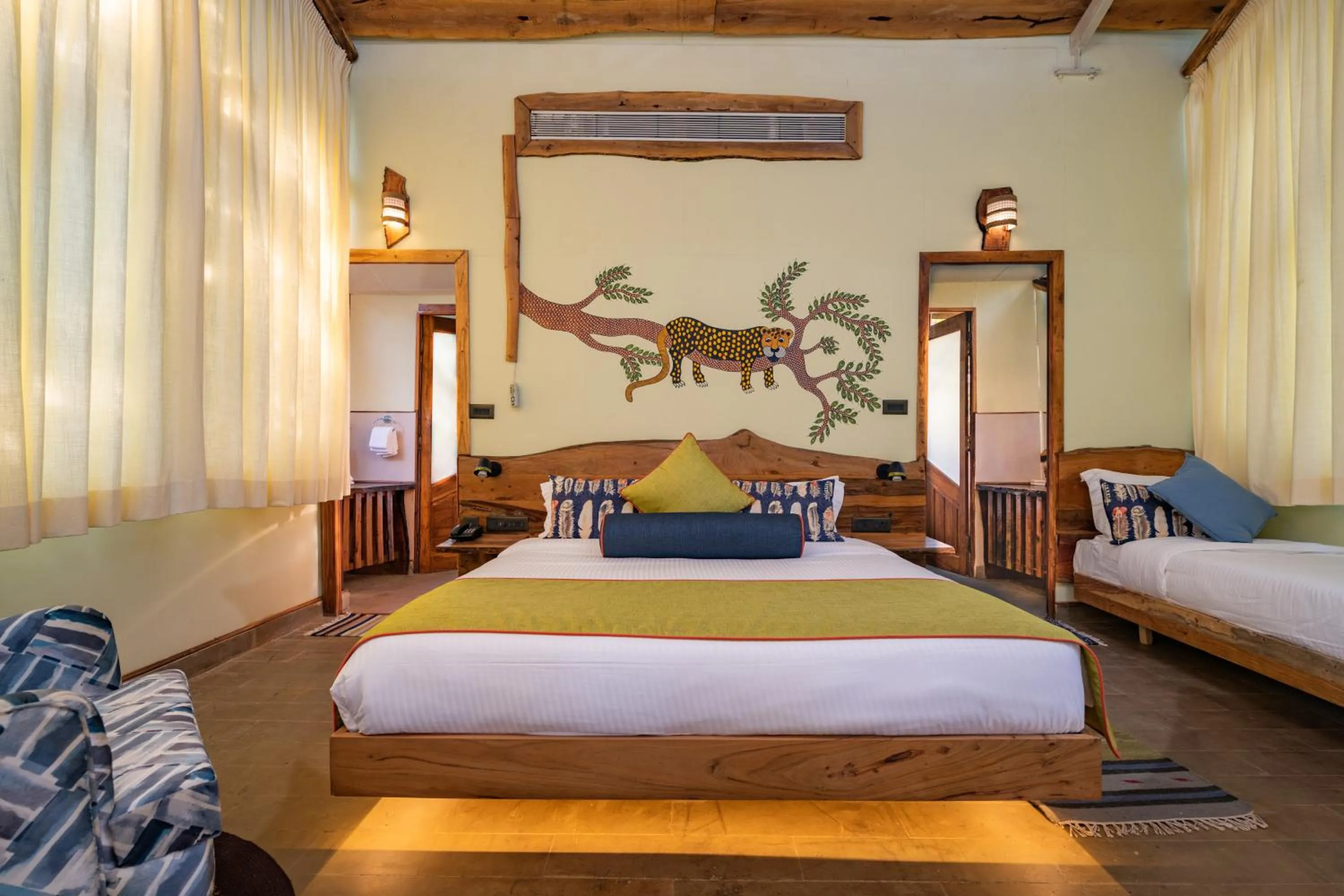 Bed in Kanha Jungle Camp