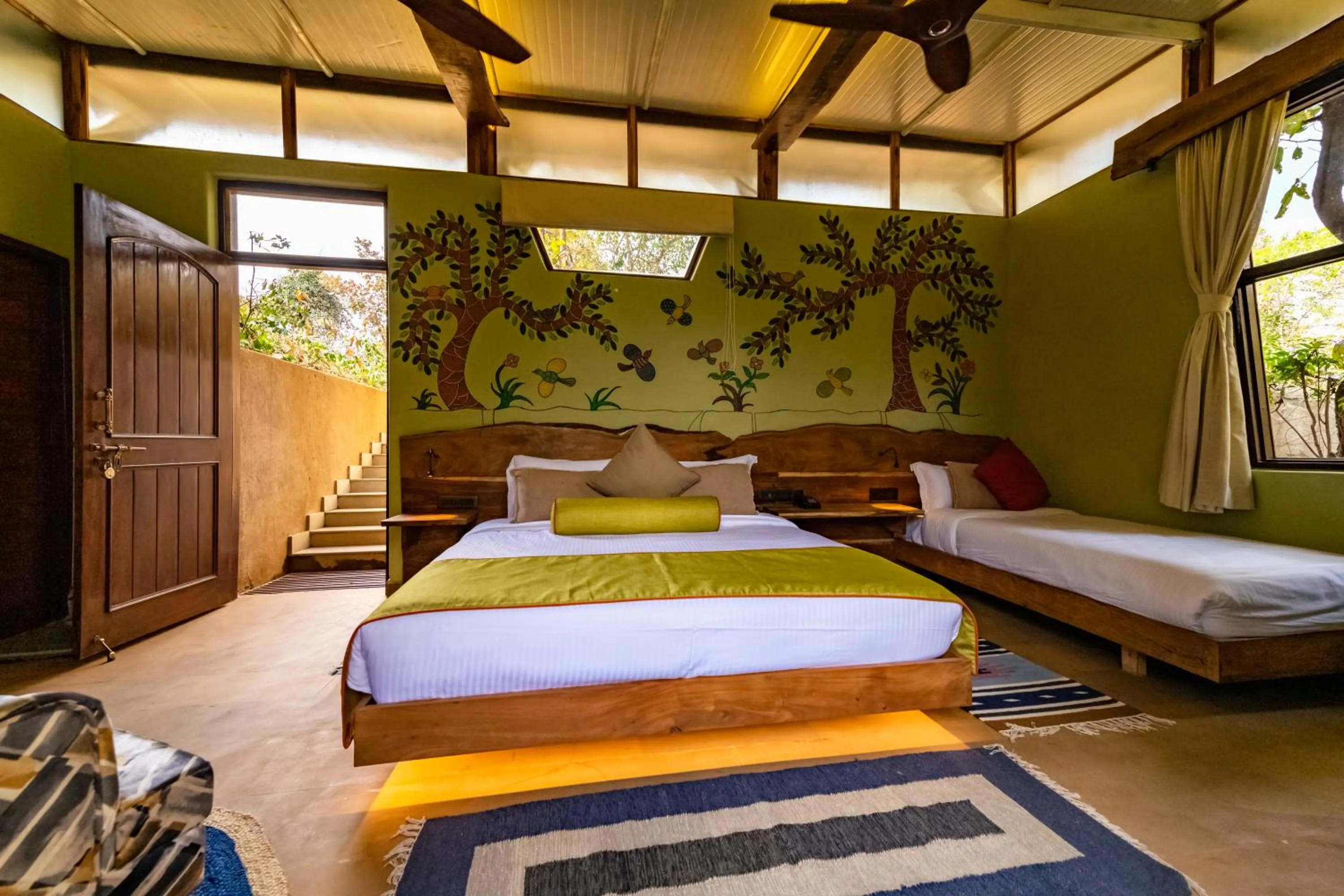 Bed in Kanha Jungle Camp