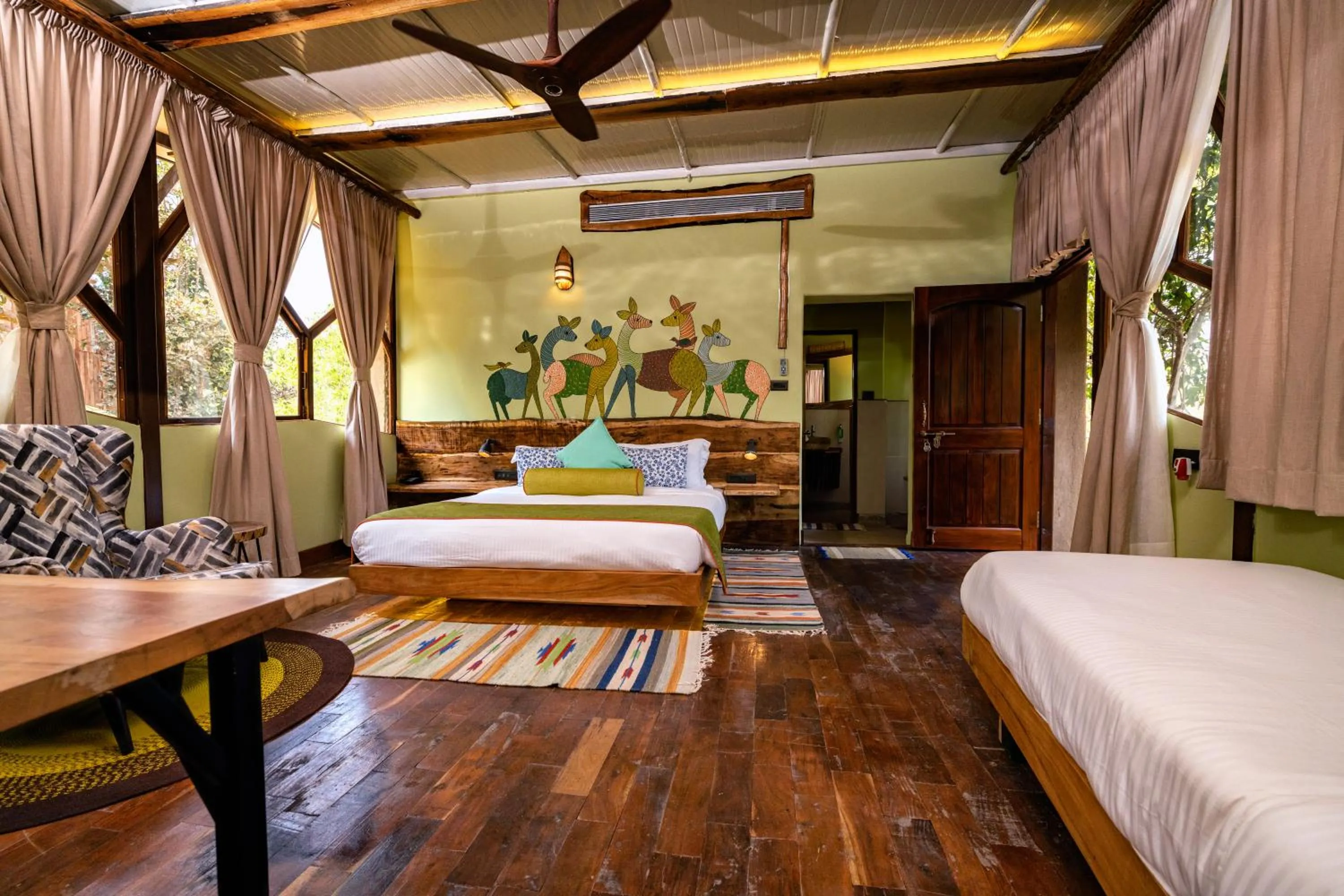 Bed in Kanha Jungle Camp