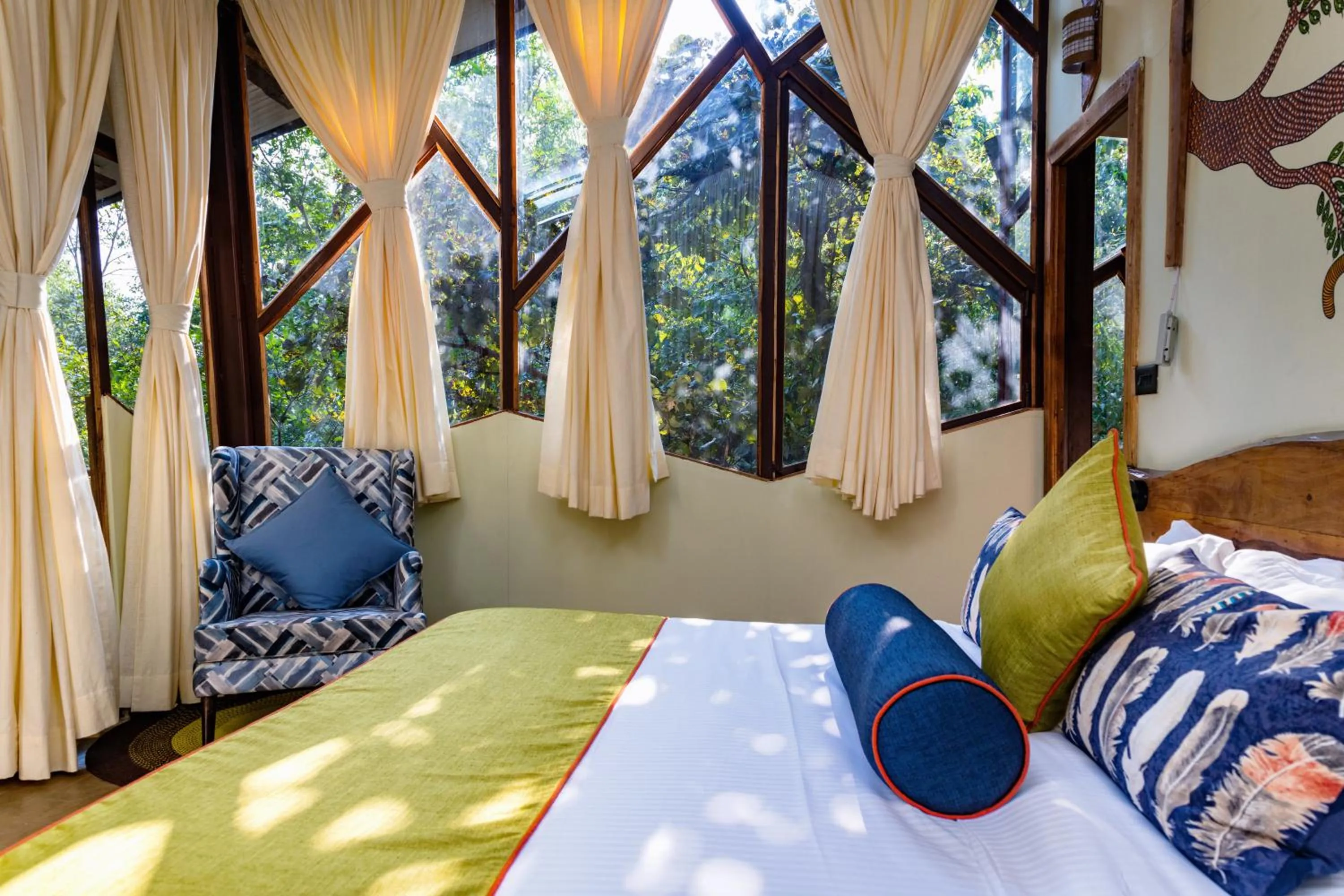 Bed in Kanha Jungle Camp