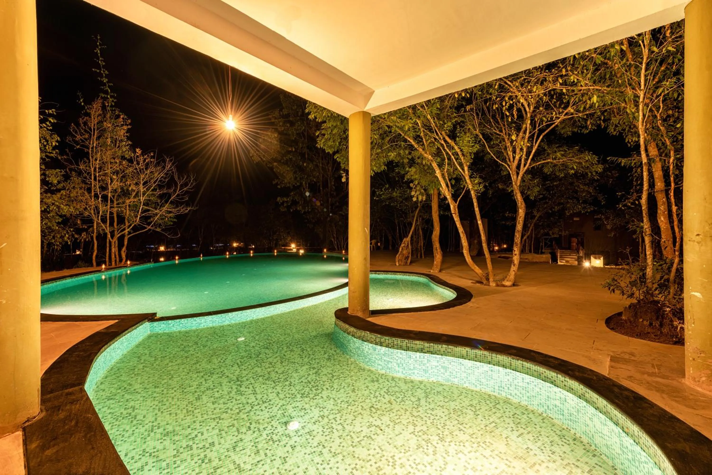 Swimming pool in Kanha Jungle Camp