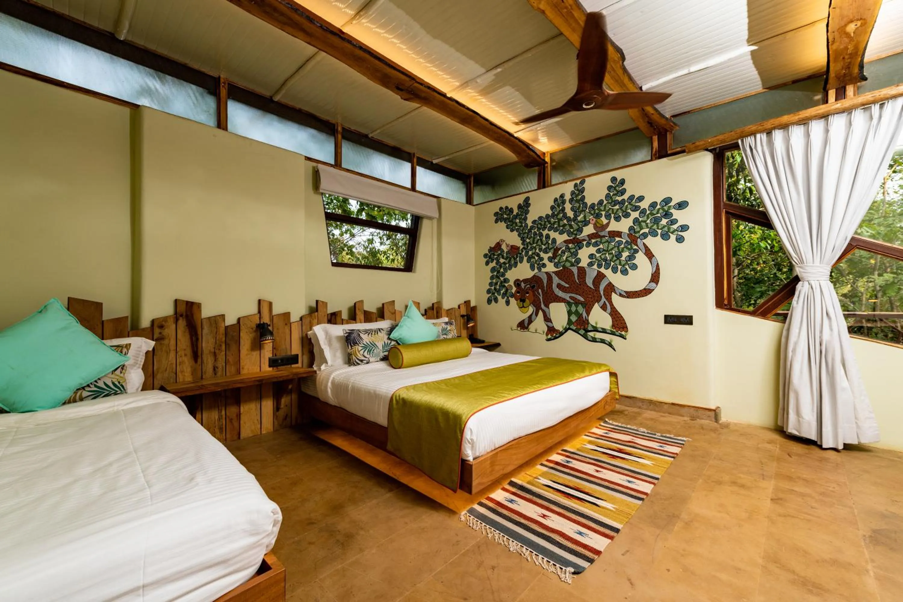 Bed in Kanha Jungle Camp