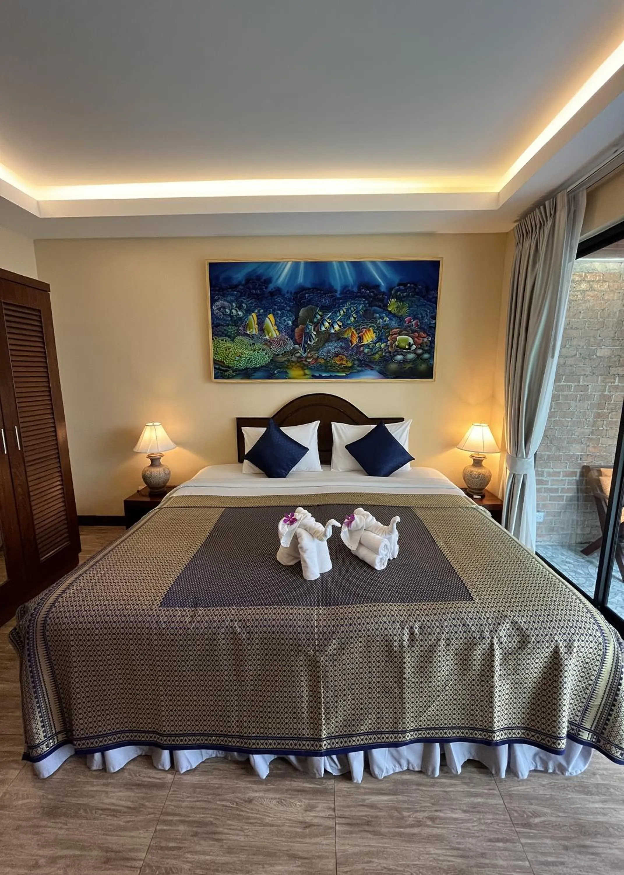 Photo of the whole room, Bed in Ginis Beach Resort