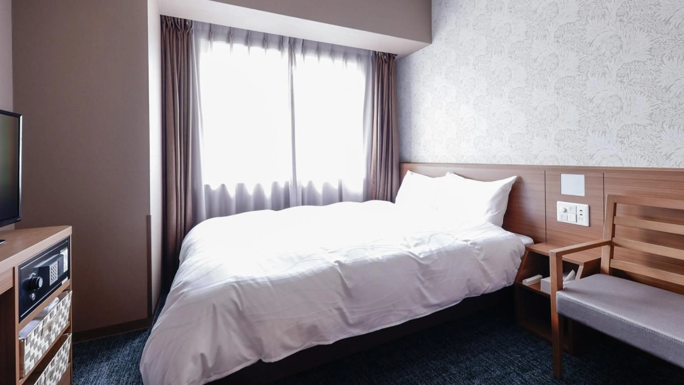 Bed in Dormy Inn Kobe Motomachi Natural Hot Springs