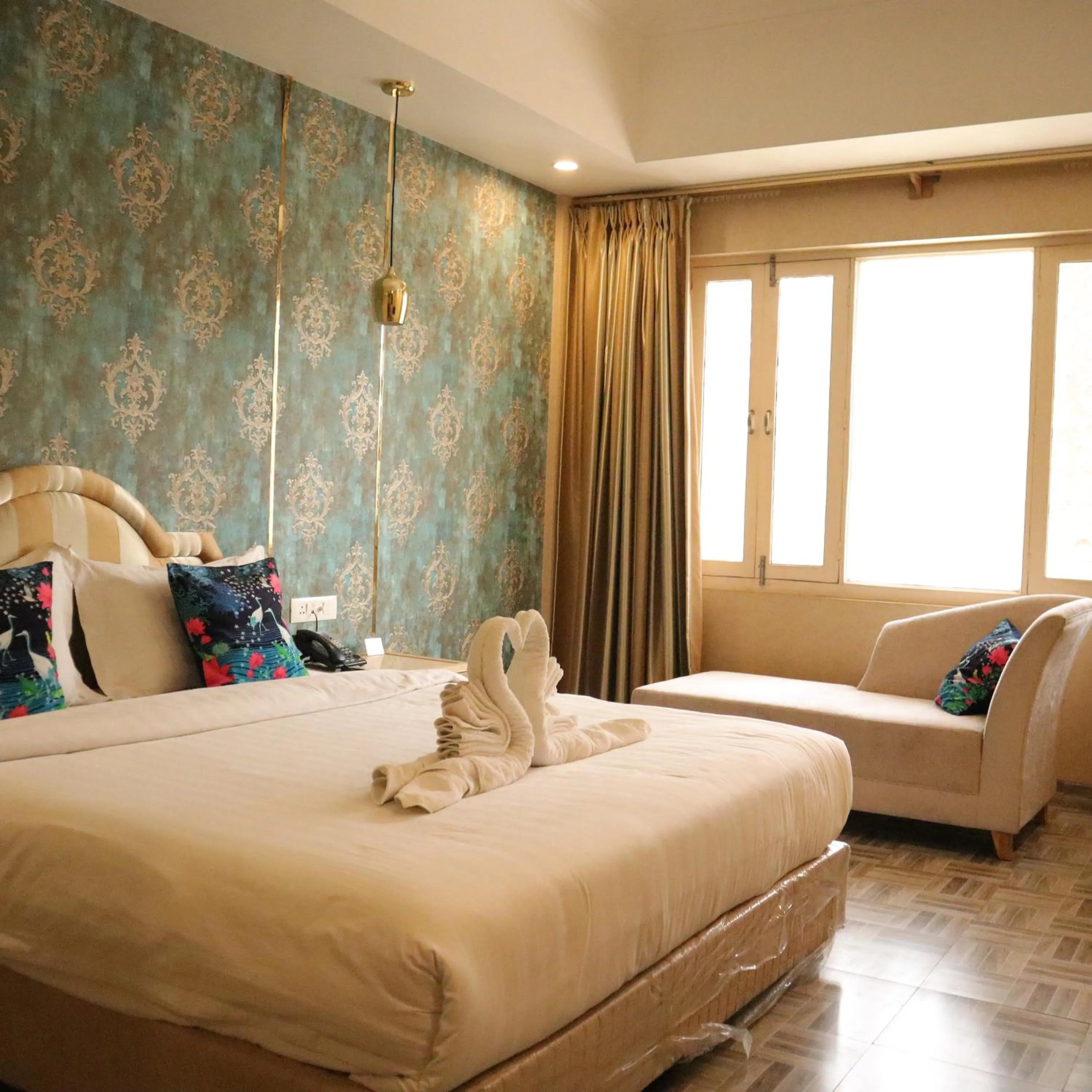 Bed in Hotel CASA Aishbagh