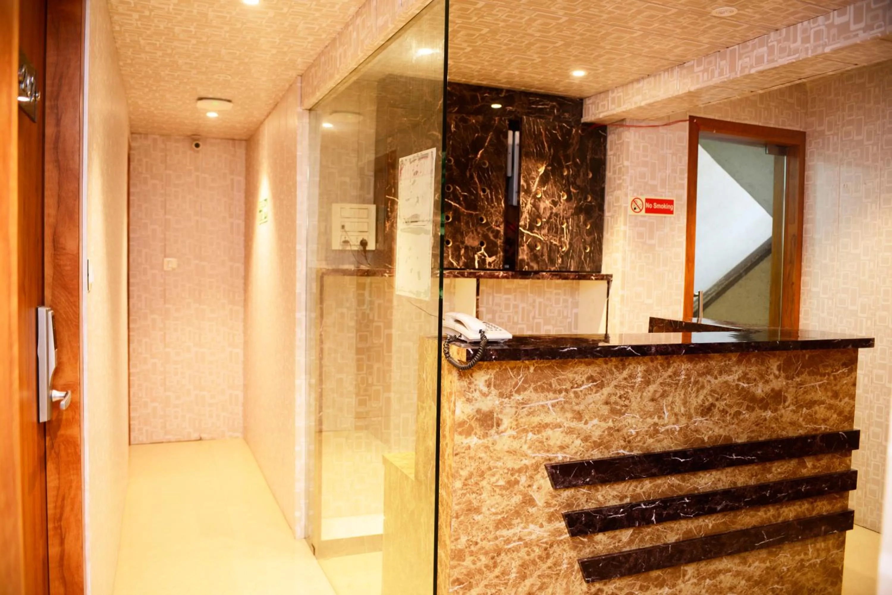 Lobby or reception in Hotel Malad Inn opposite Malad Railway Station