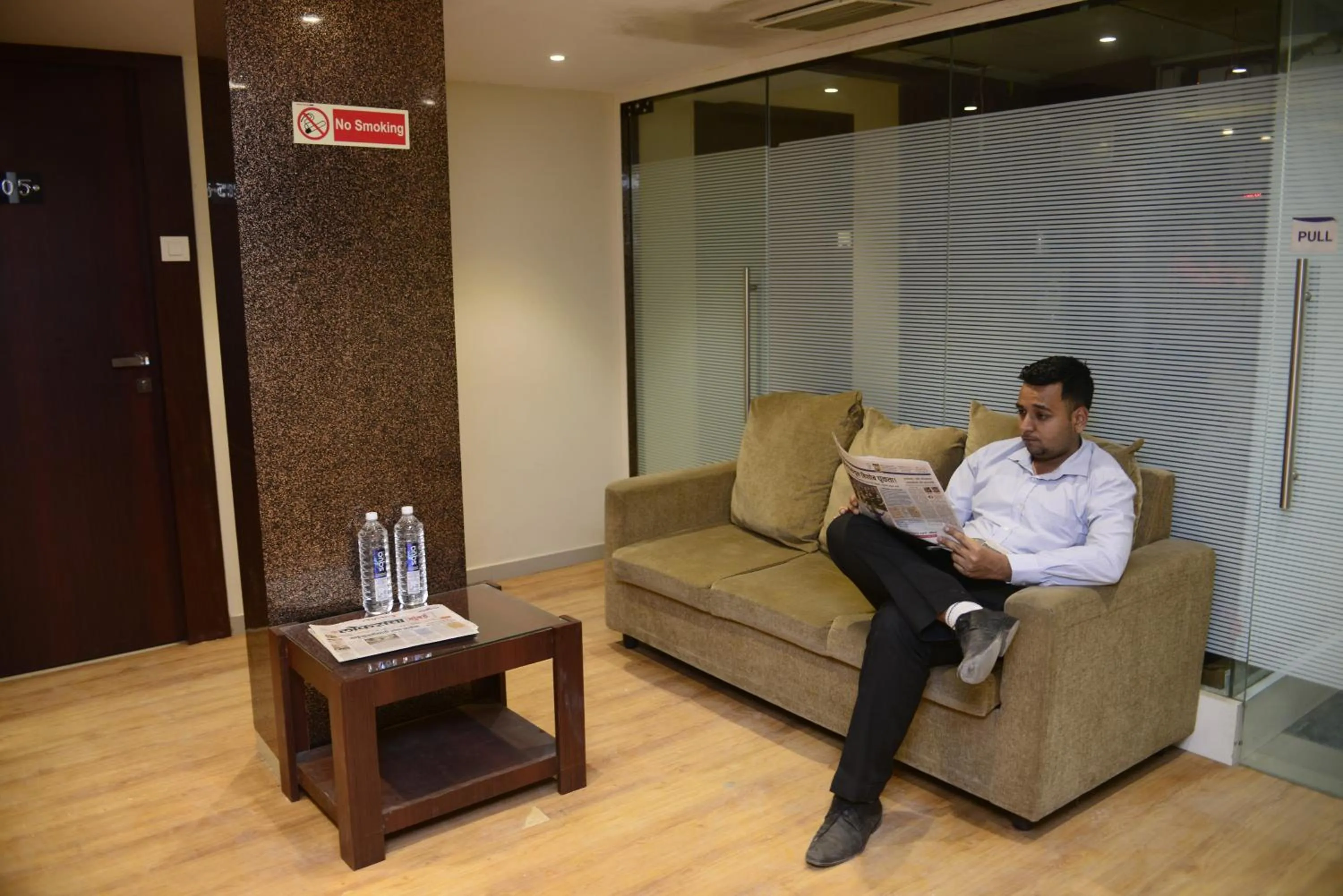 Seating area in Hotel Malad Inn opposite Malad Railway Station
