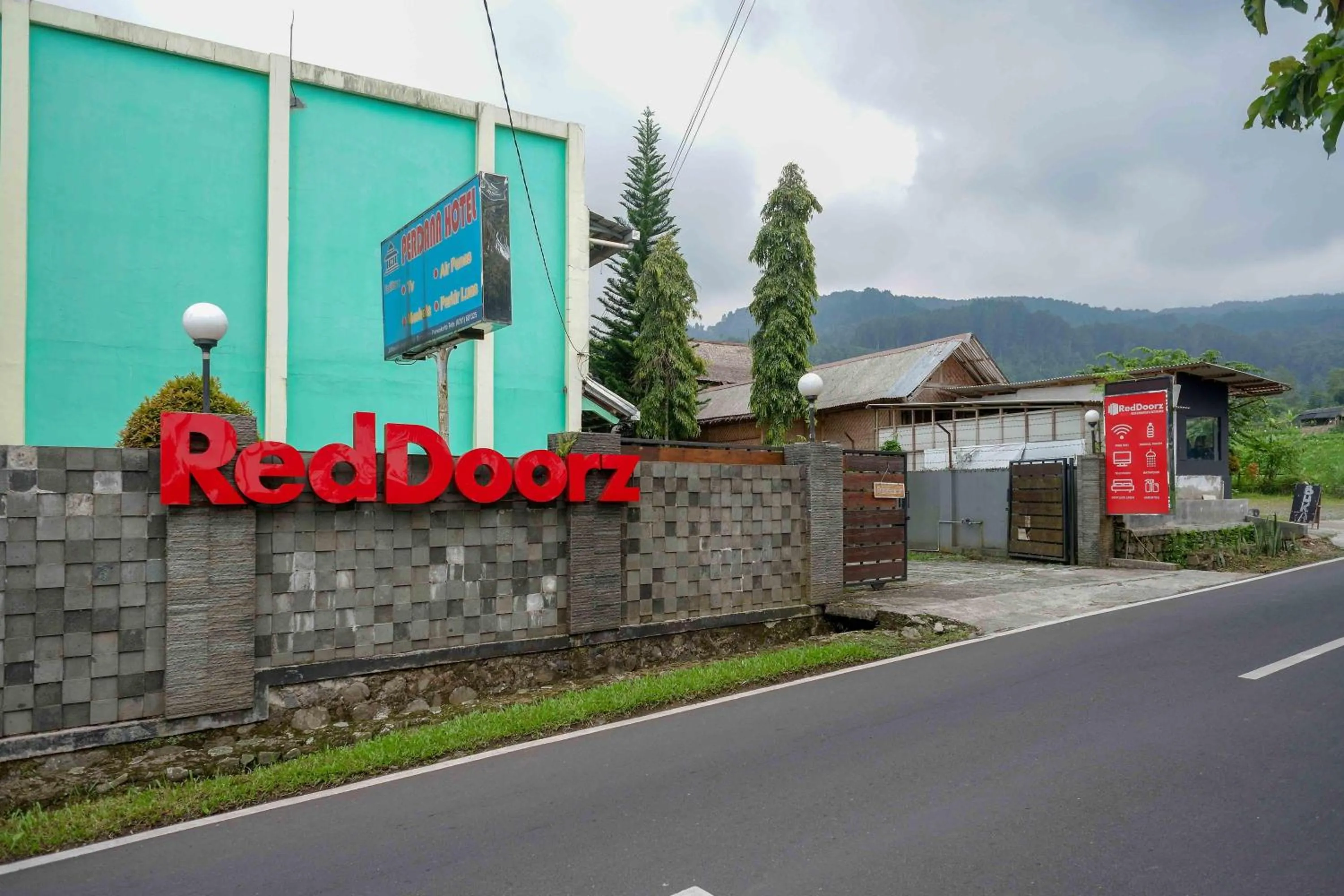 Property logo or sign in RedDoorz near Lokawisata Baturaden
