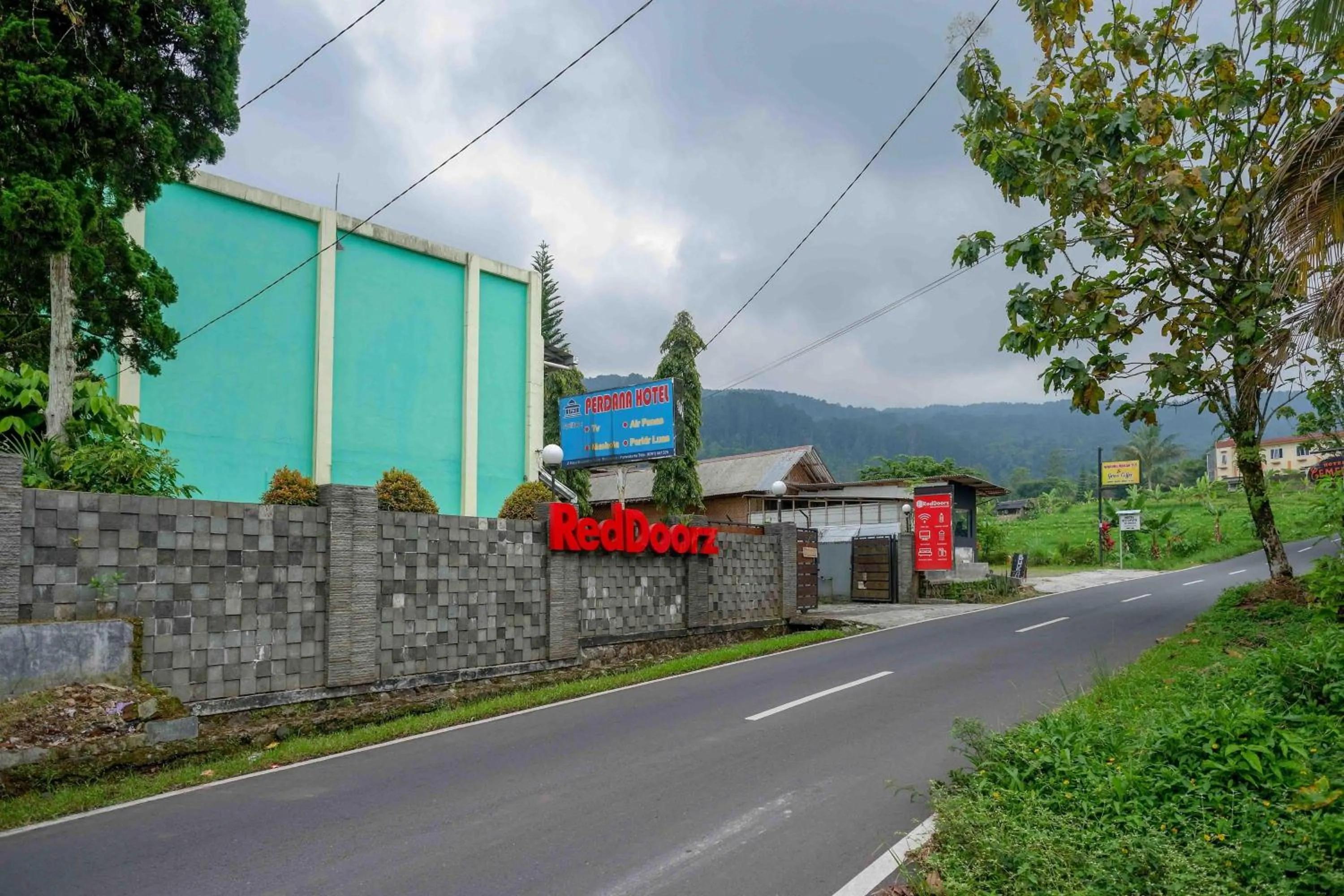 Property logo or sign in RedDoorz near Lokawisata Baturaden