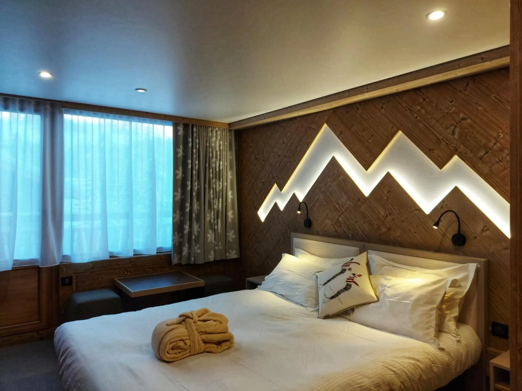 Bed in Hôtel Les Sherpas