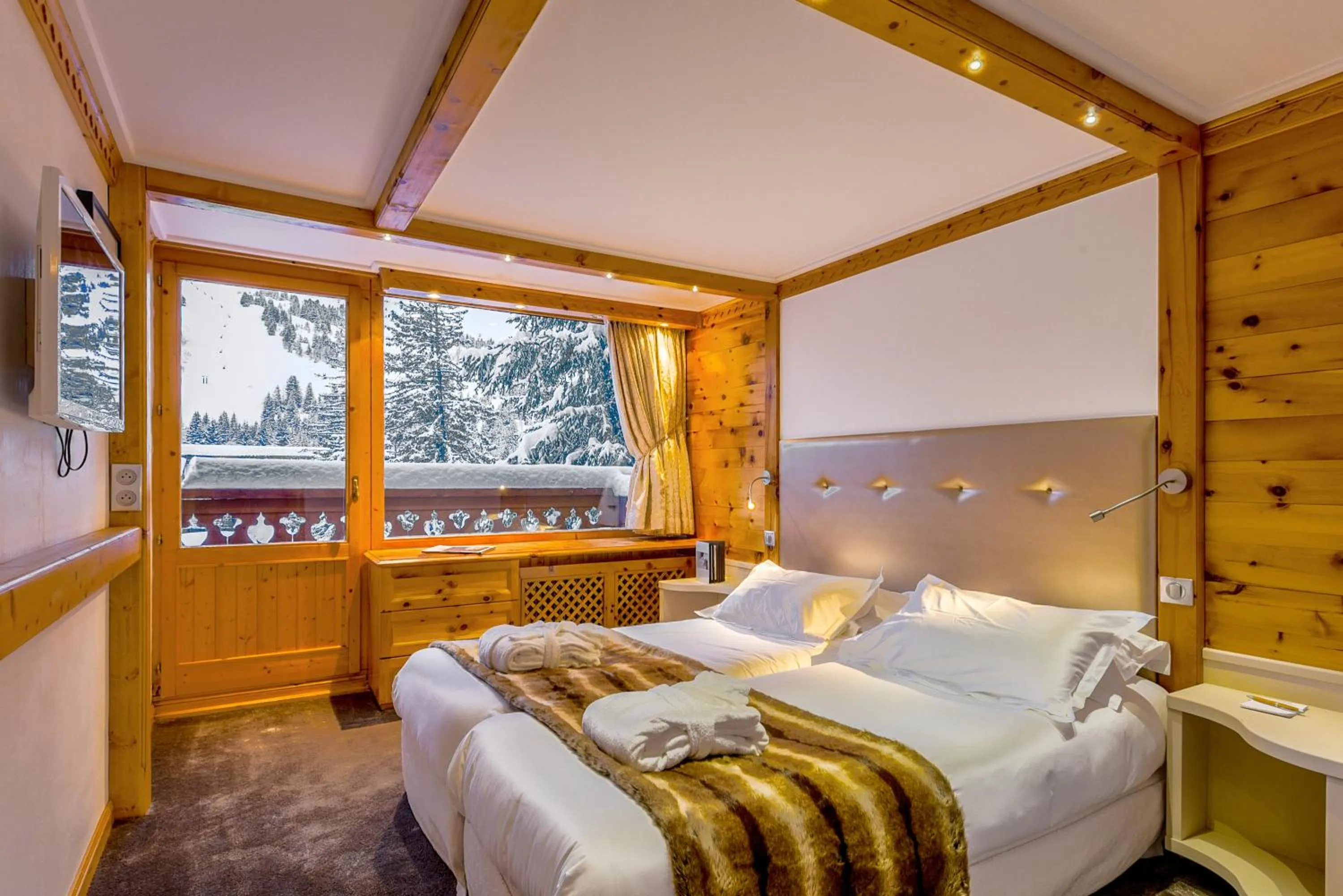 Bed in Hôtel Les Sherpas