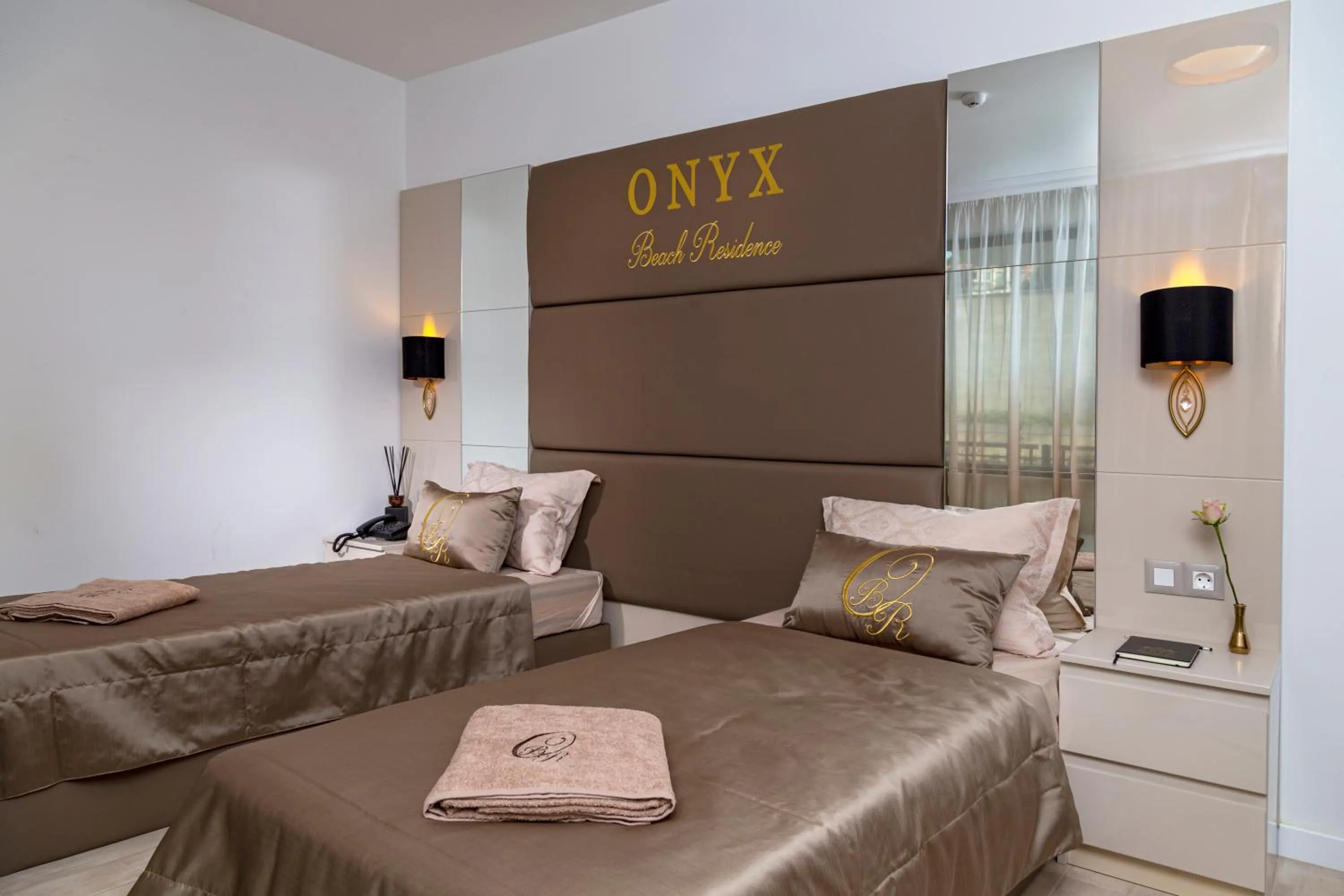 Bed in Onyx Beach Residence - Free Beach Access & Parking