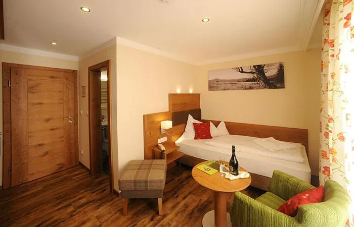 Photo of the whole room, Bed in Ferienhotel Hubertus