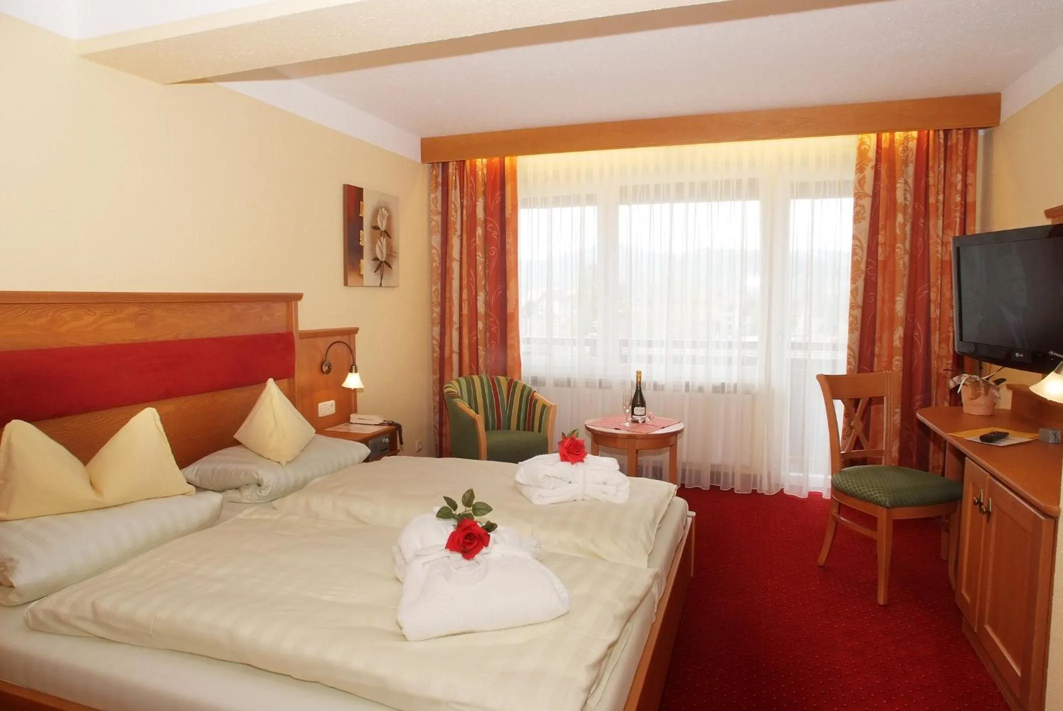 Photo of the whole room, Bed in Ferienhotel Hubertus