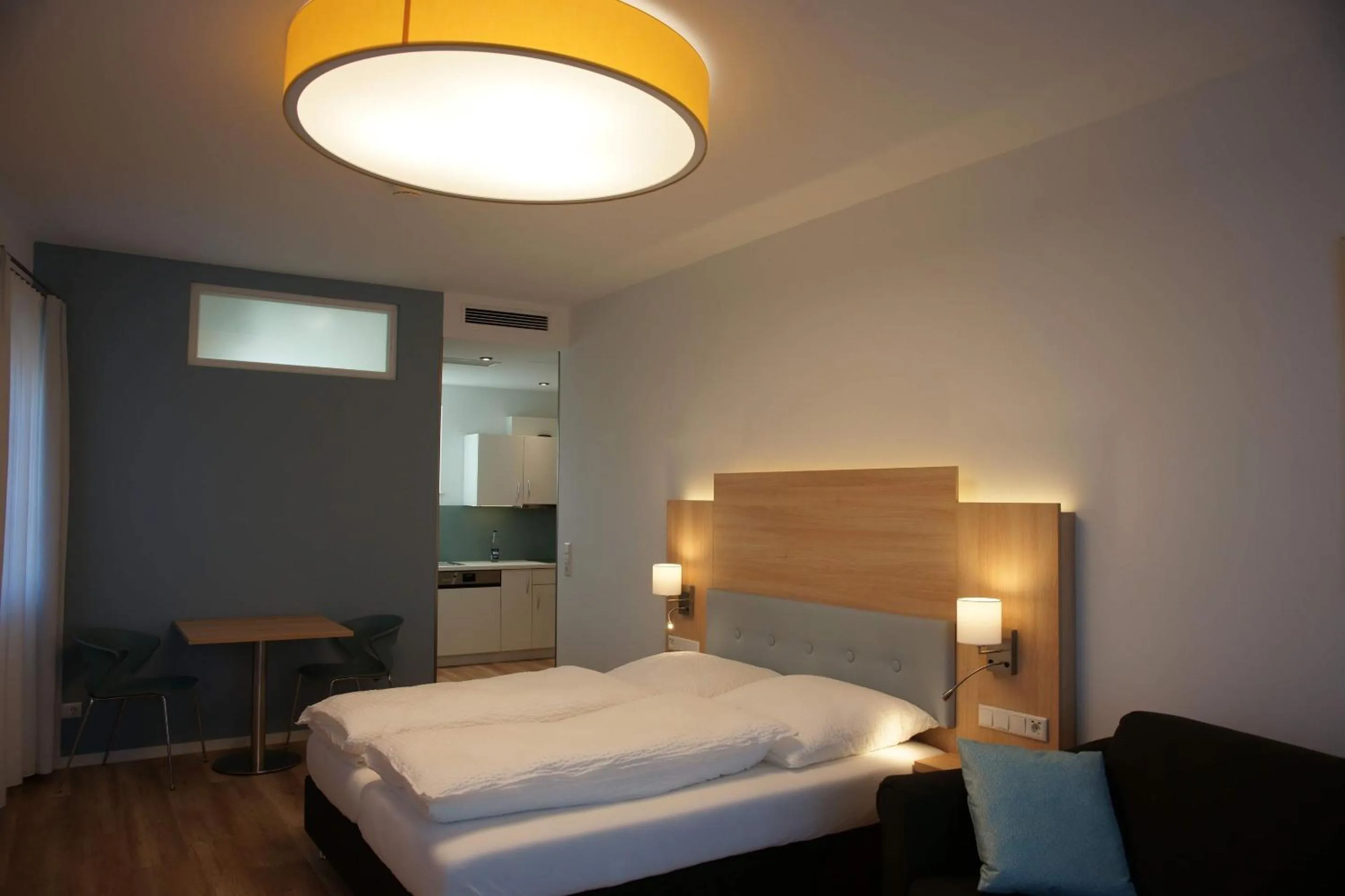 Bed in Leister Apparthotel