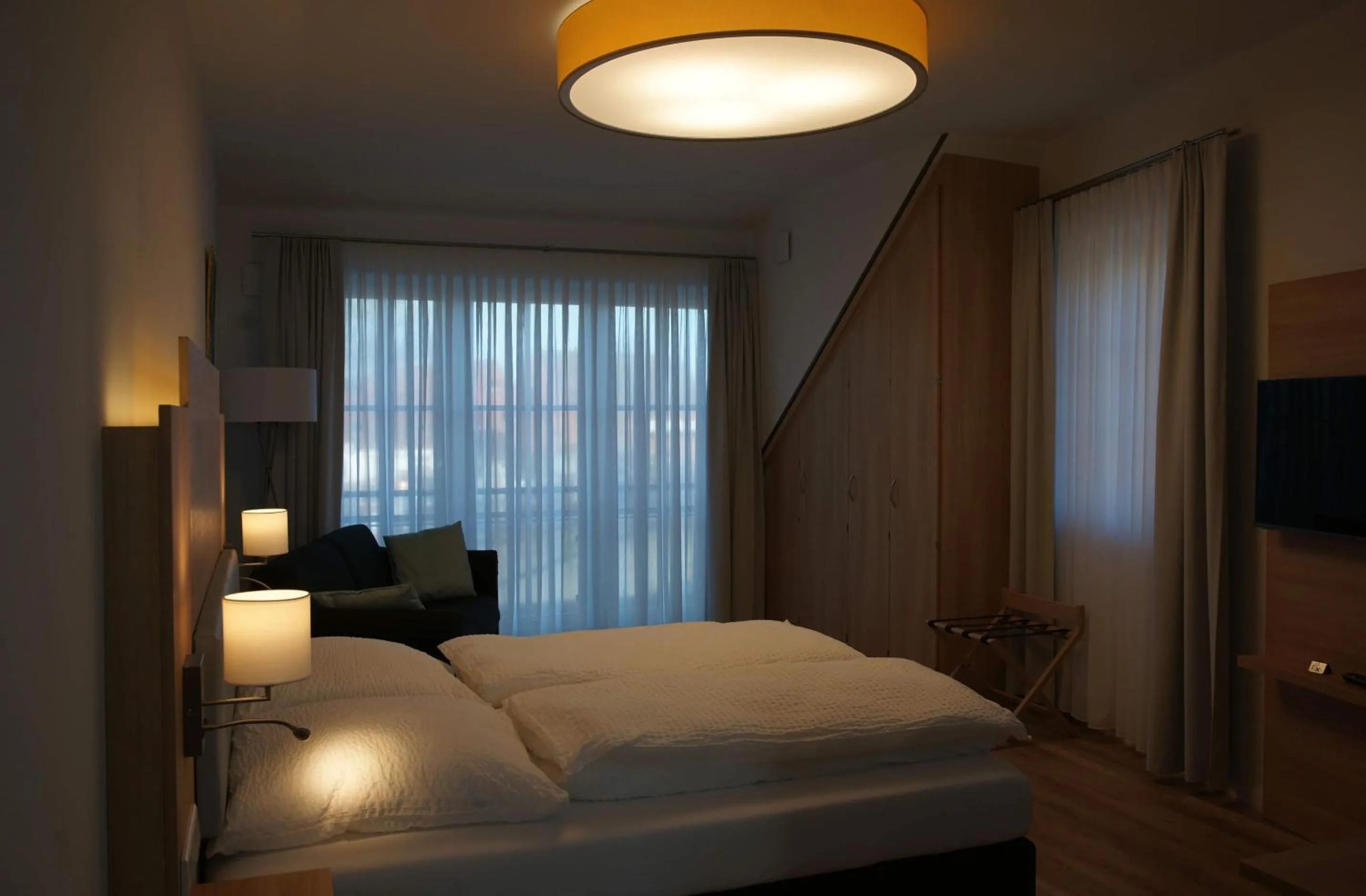 Bed in Leister Apparthotel