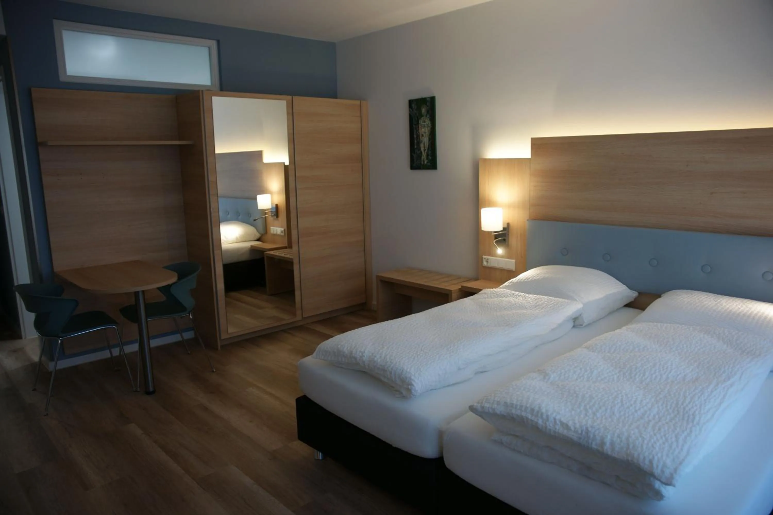 Bed in Leister Apparthotel