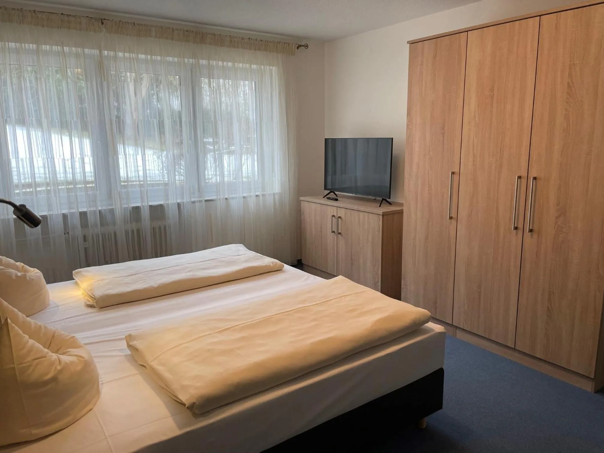 Bedroom in Hotel Apollo Garni