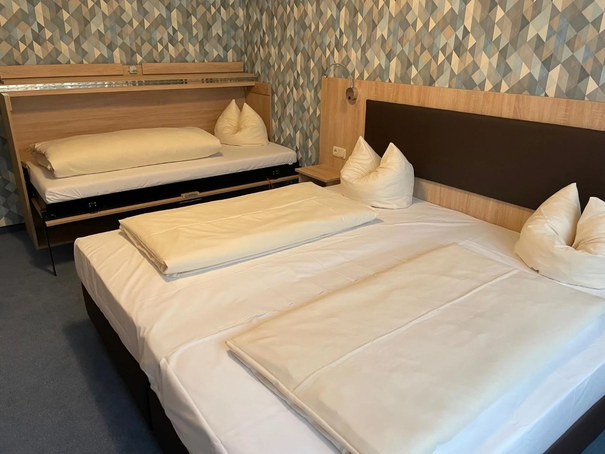 Bedroom in Hotel Apollo Garni