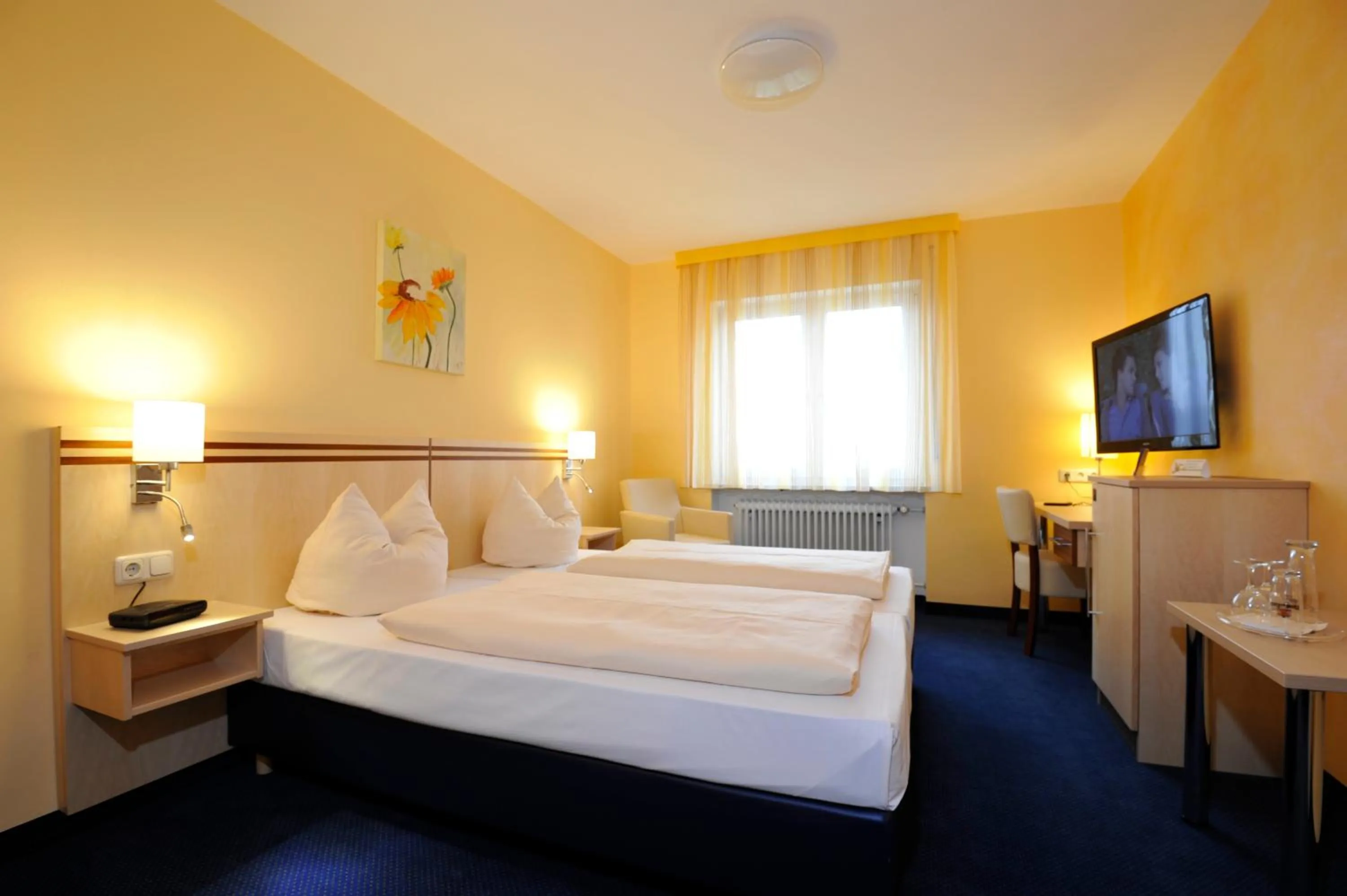 Bedroom in Hotel Apollo Garni