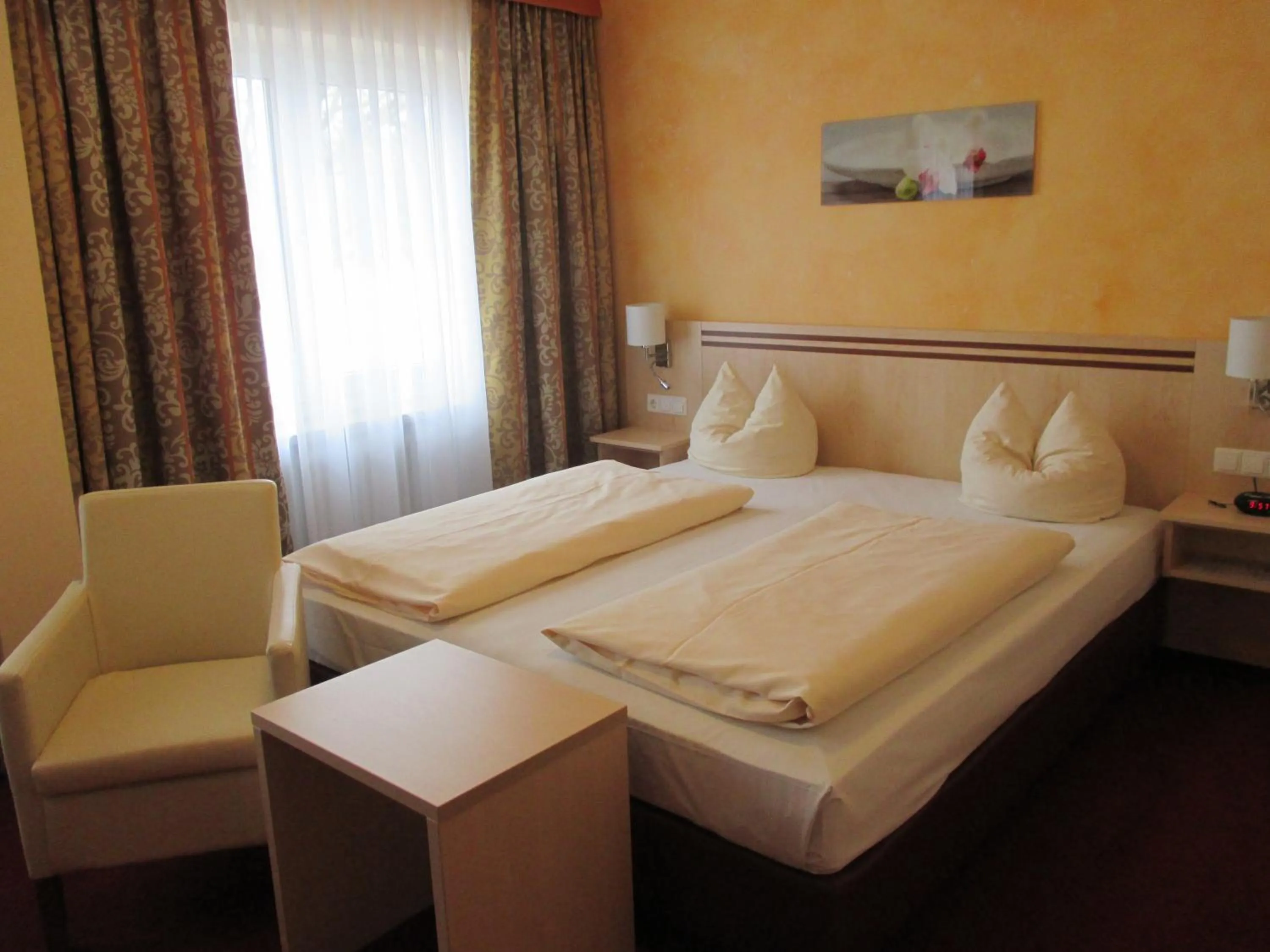Bed in Hotel Apollo Garni