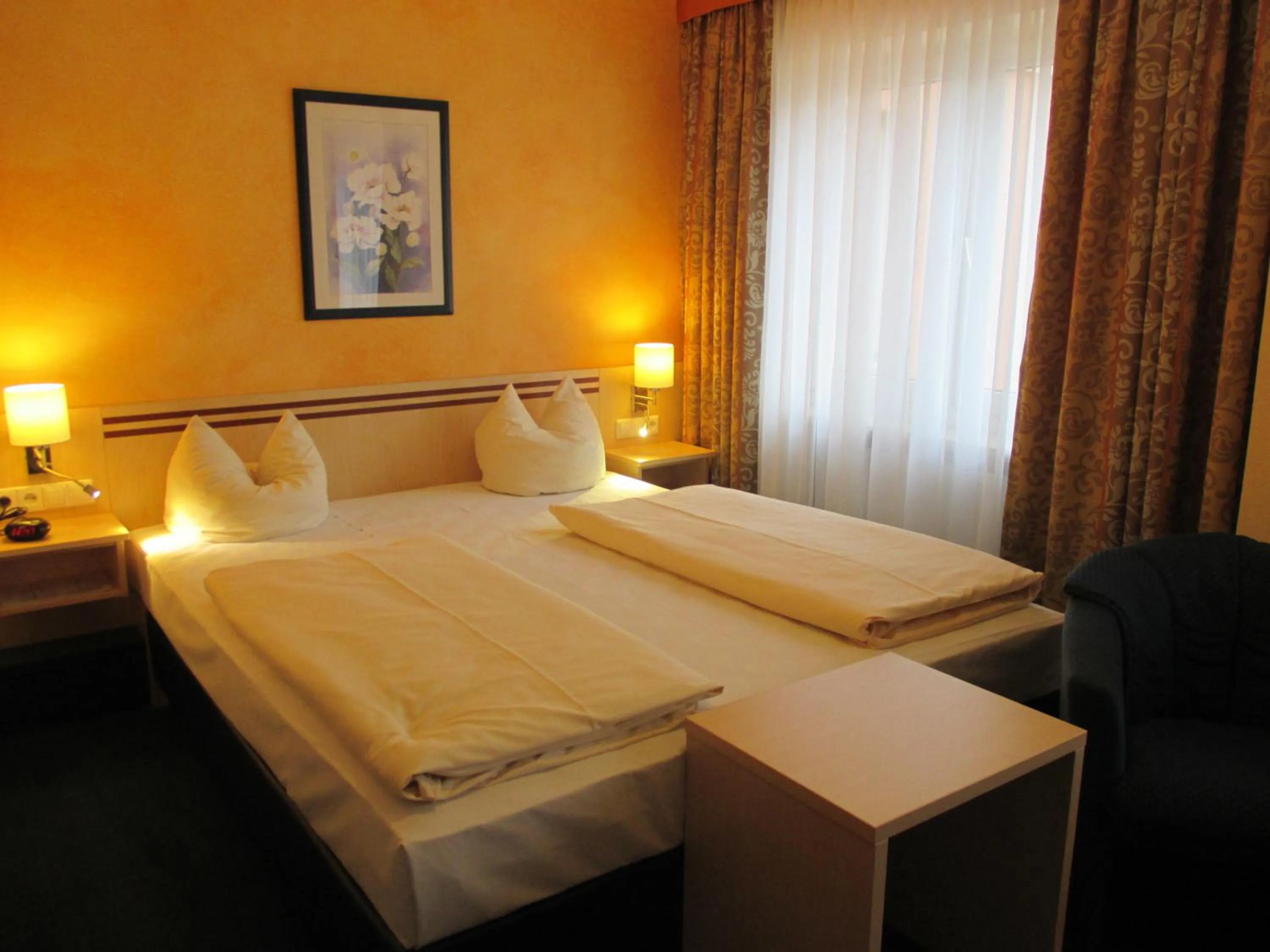 Bed in Hotel Apollo Garni