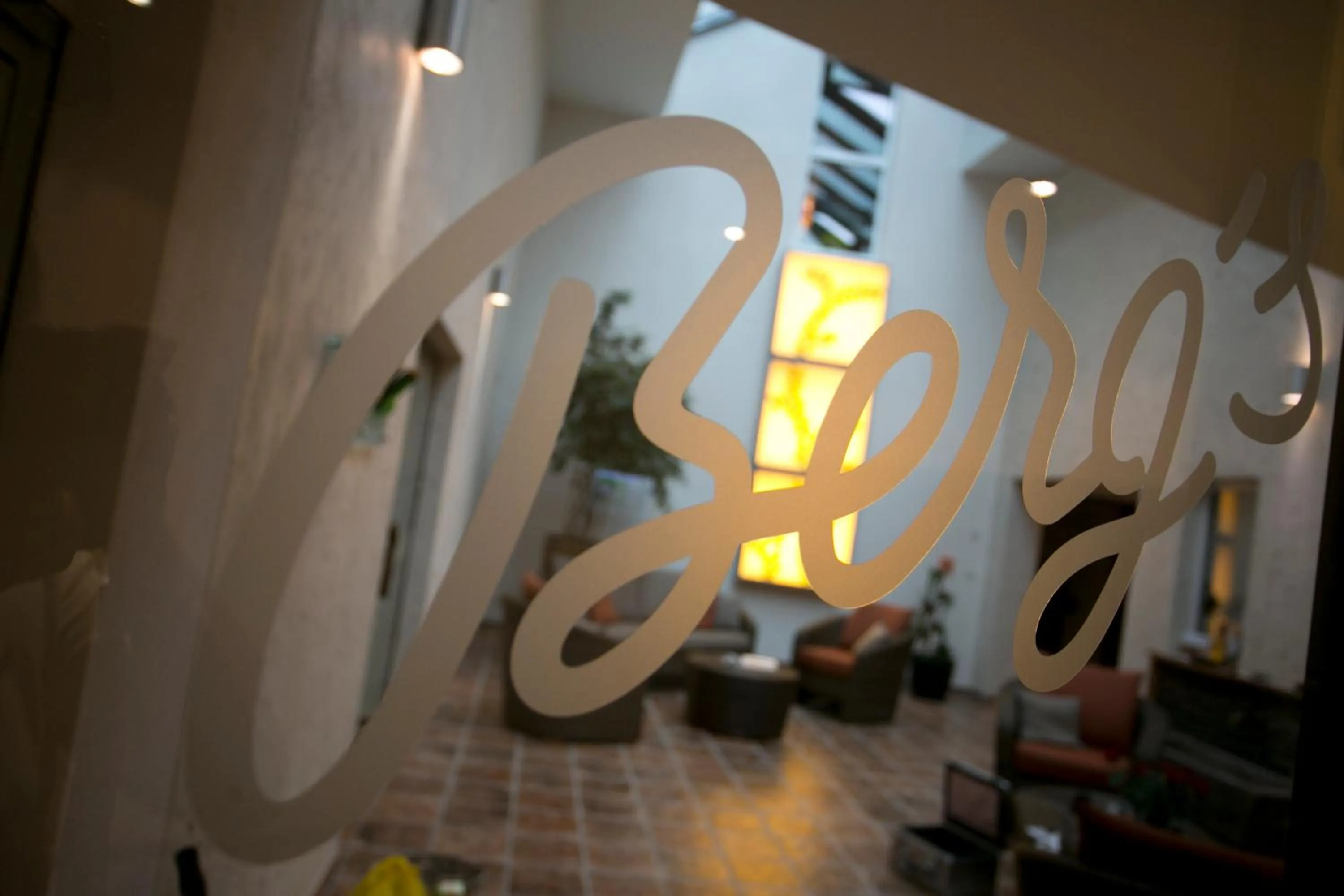 Property logo or sign in AKZENT Hotel Berg's Alte Bauernschänke- Wellness und Wein