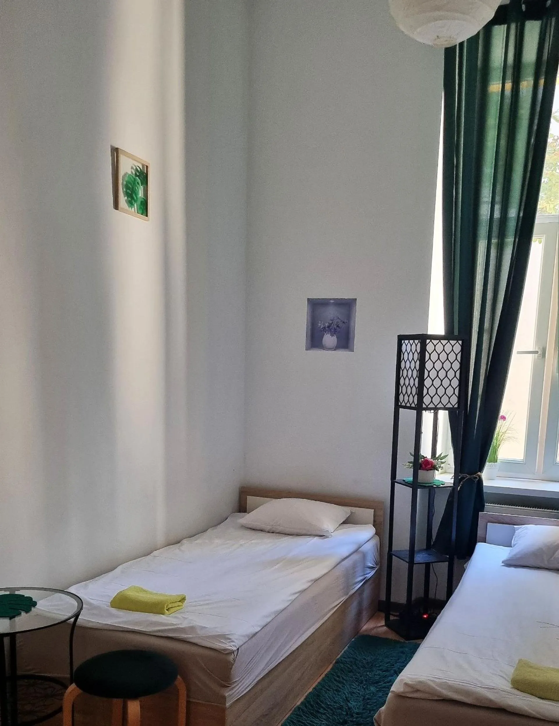 Bed in Green Cat Rooms