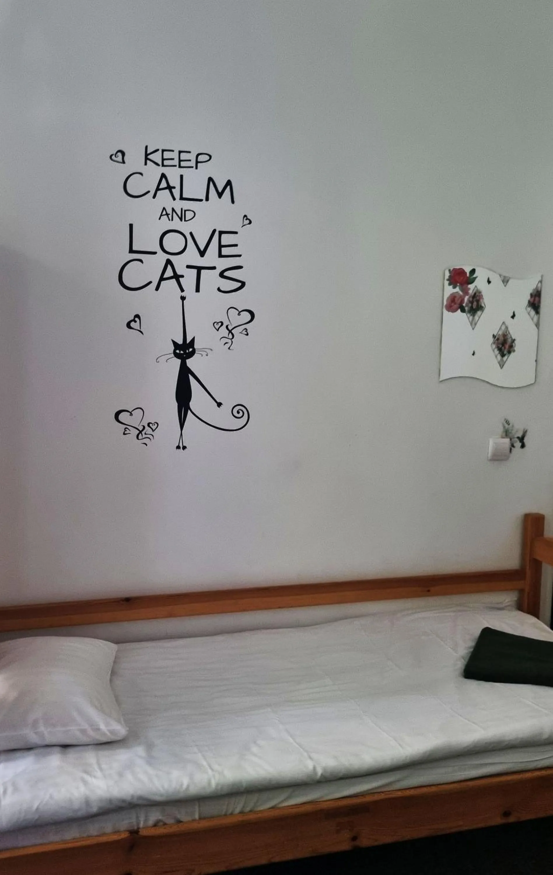 Bed in Green Cat Rooms