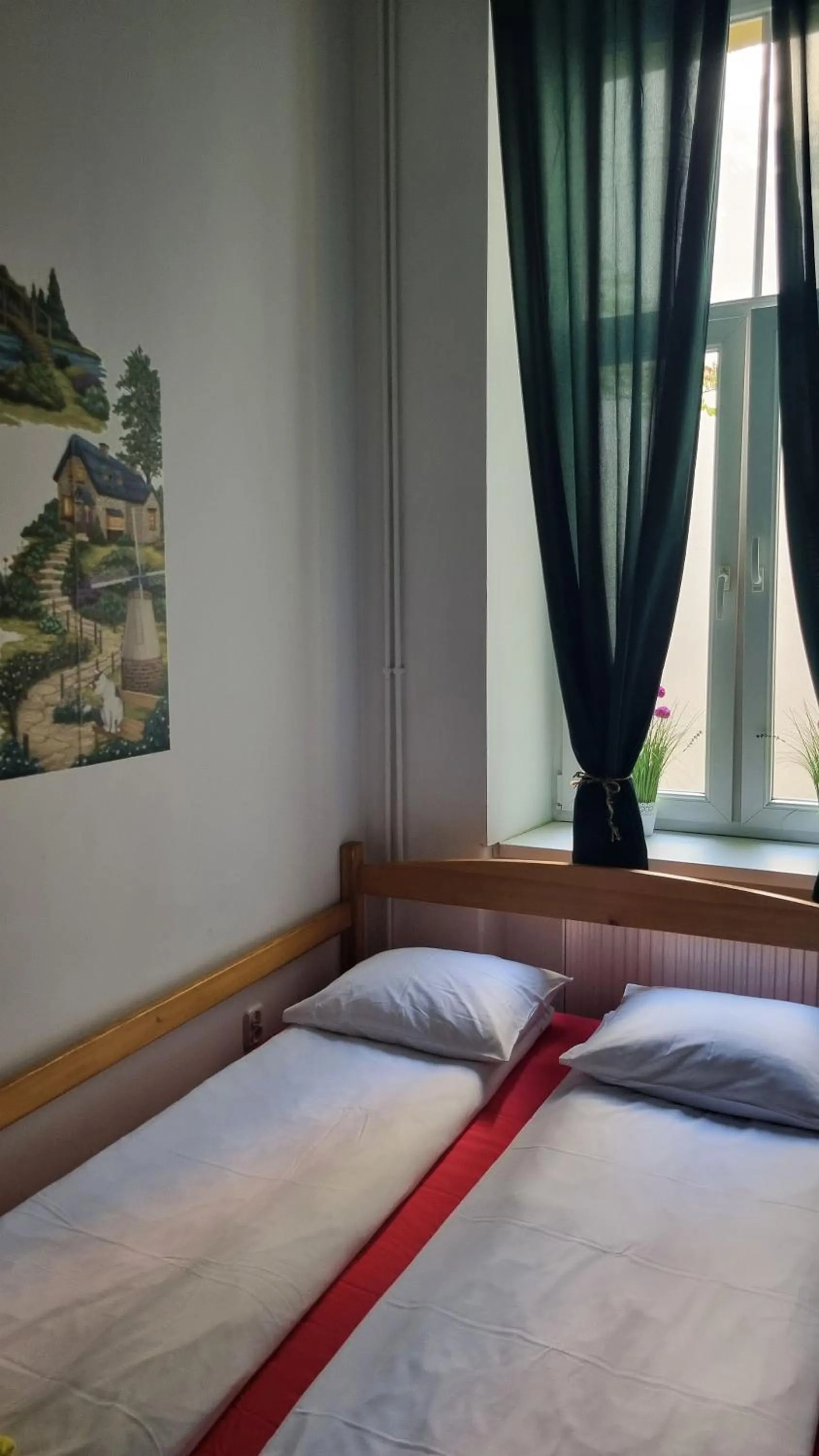 Bed in Green Cat Rooms