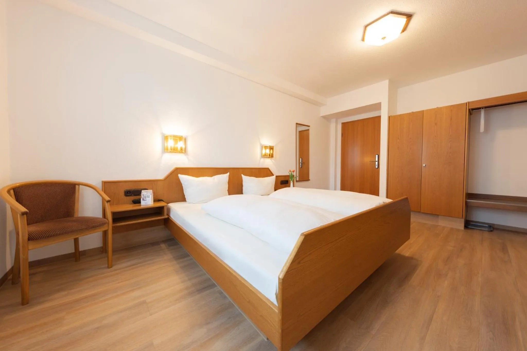 Photo of the whole room, Bed in AKZENT Hotel Meerfräulein