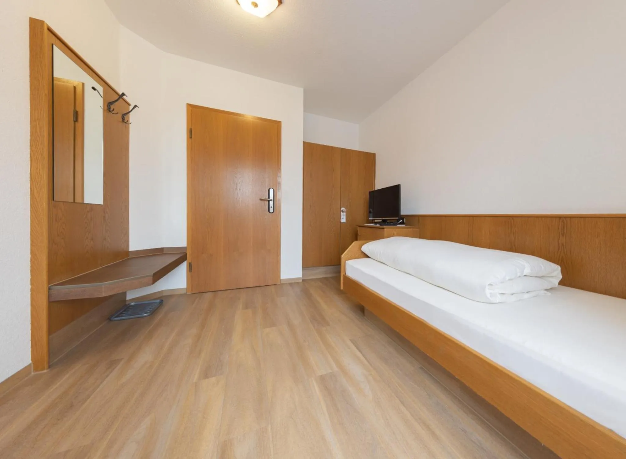 Photo of the whole room, Bed in AKZENT Hotel Meerfräulein