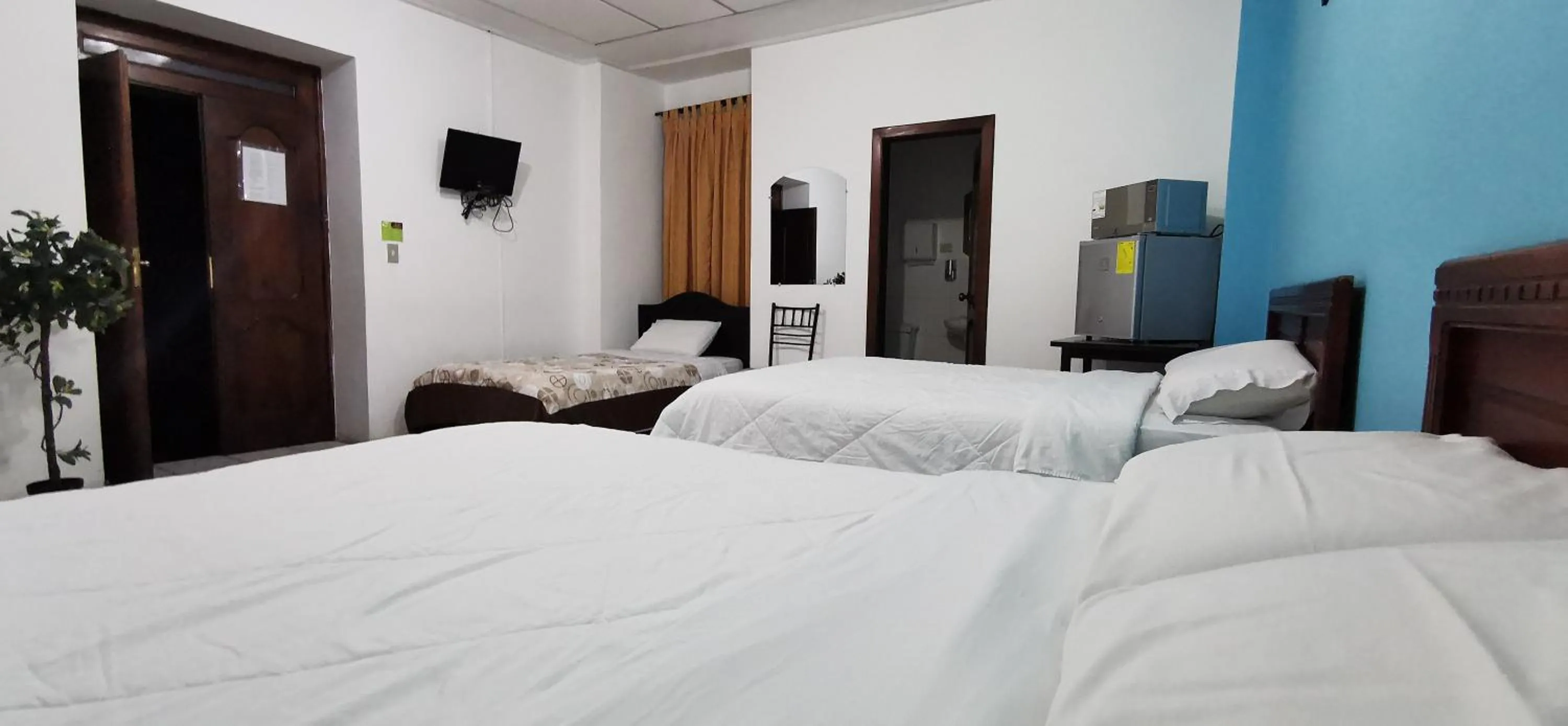 Bedroom in Hotel 4 Mundos