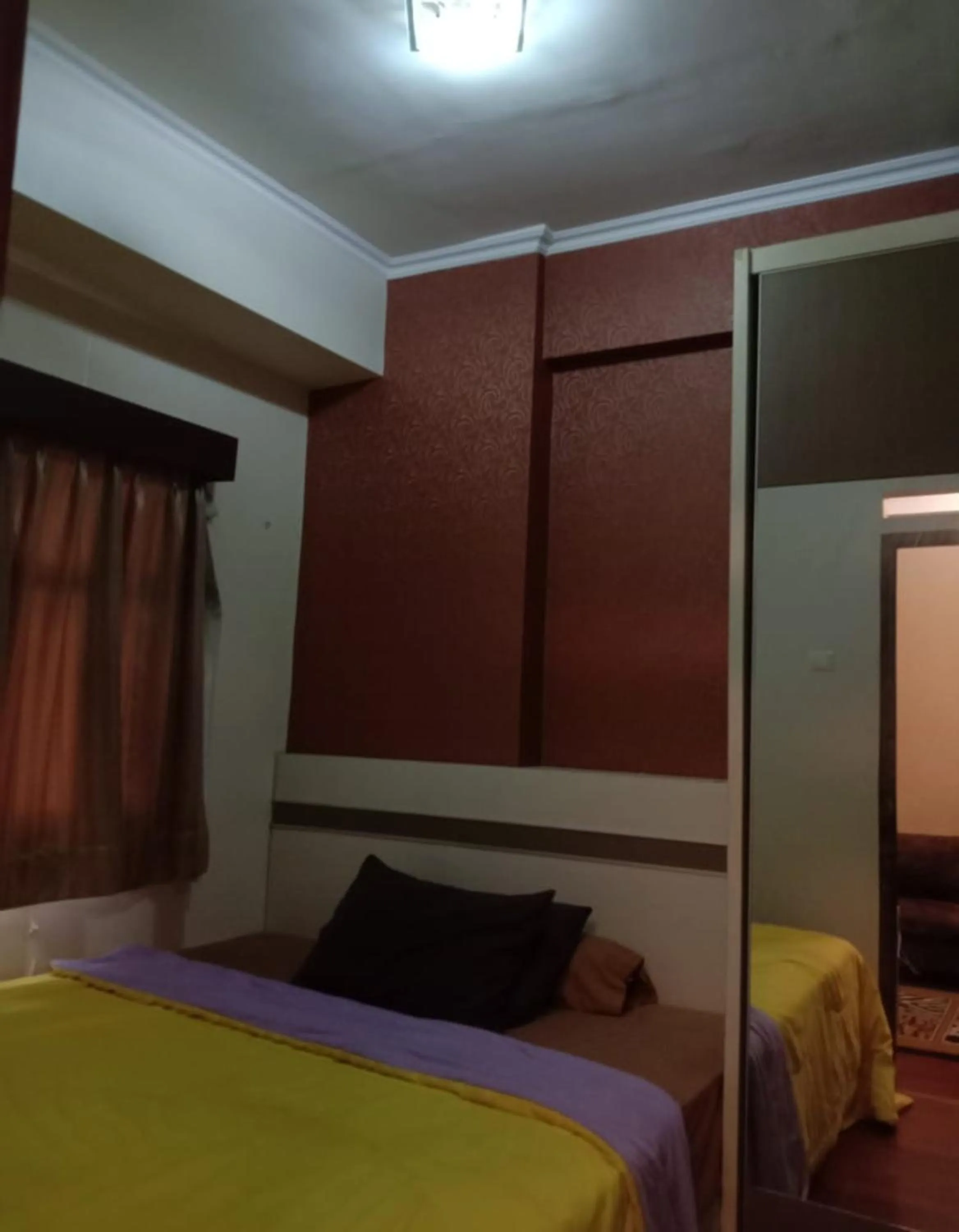 Bedroom, Bed in The Suites Metro Apartment by NFO Property
