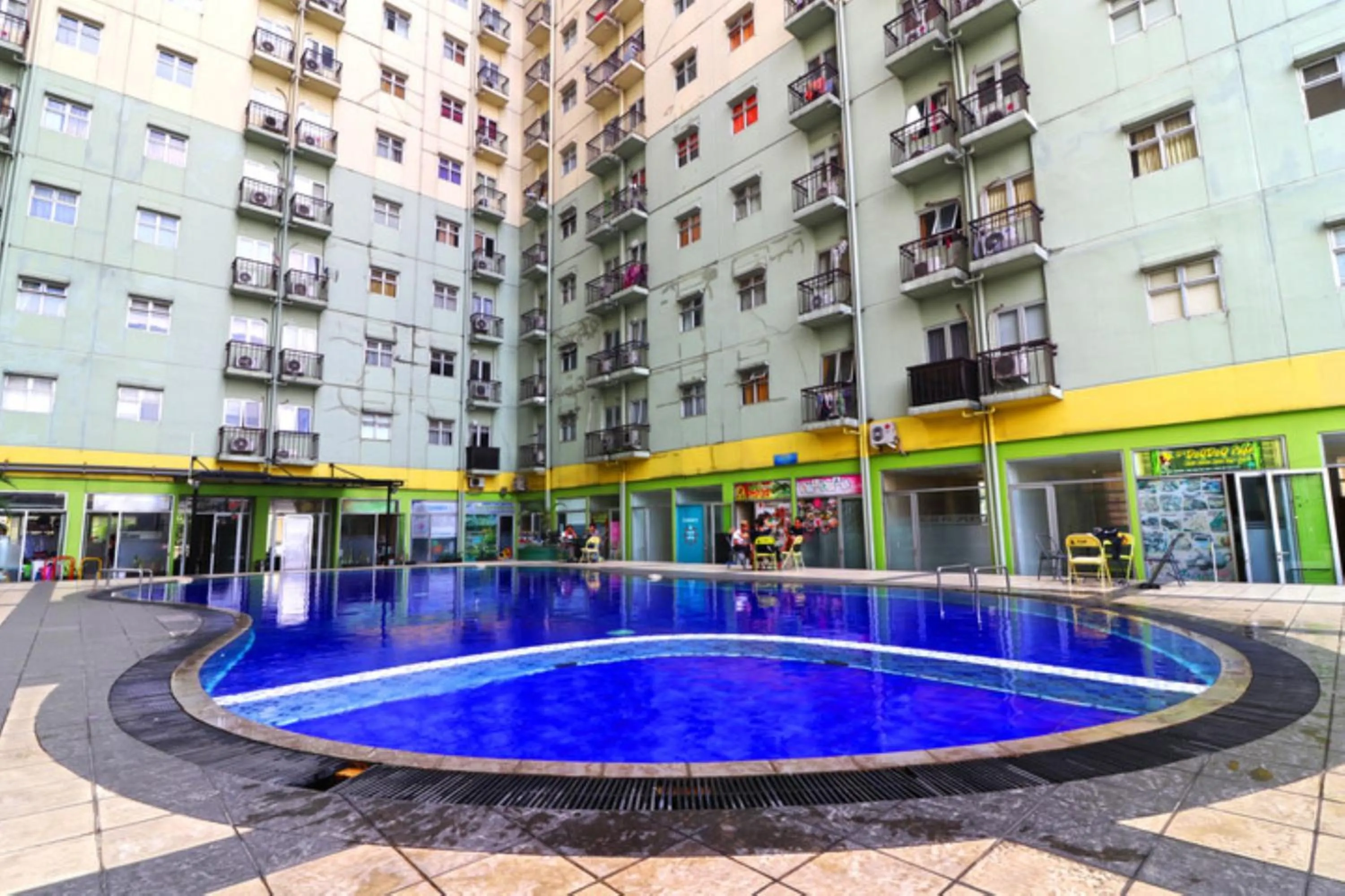 Property building in The Suites Metro Apartment by NFO Property