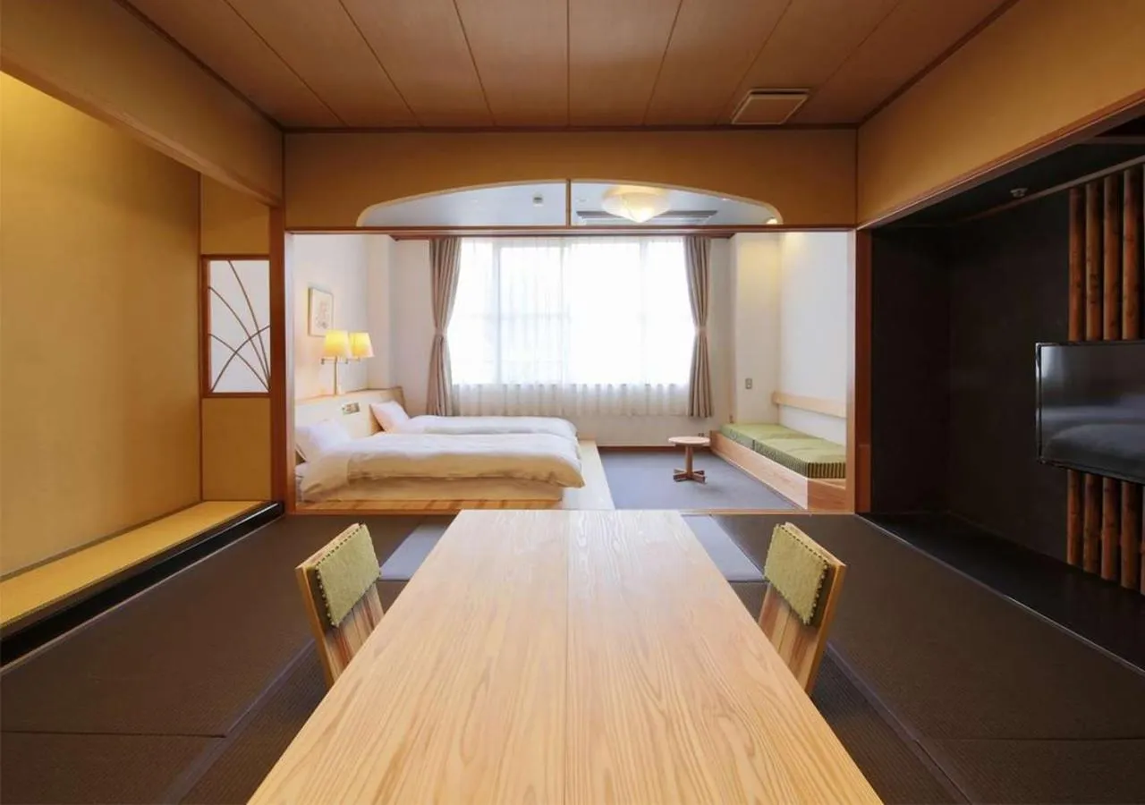 Photo of the whole room, Bed in RYOKAN OQOQ-Tamai Bekkan